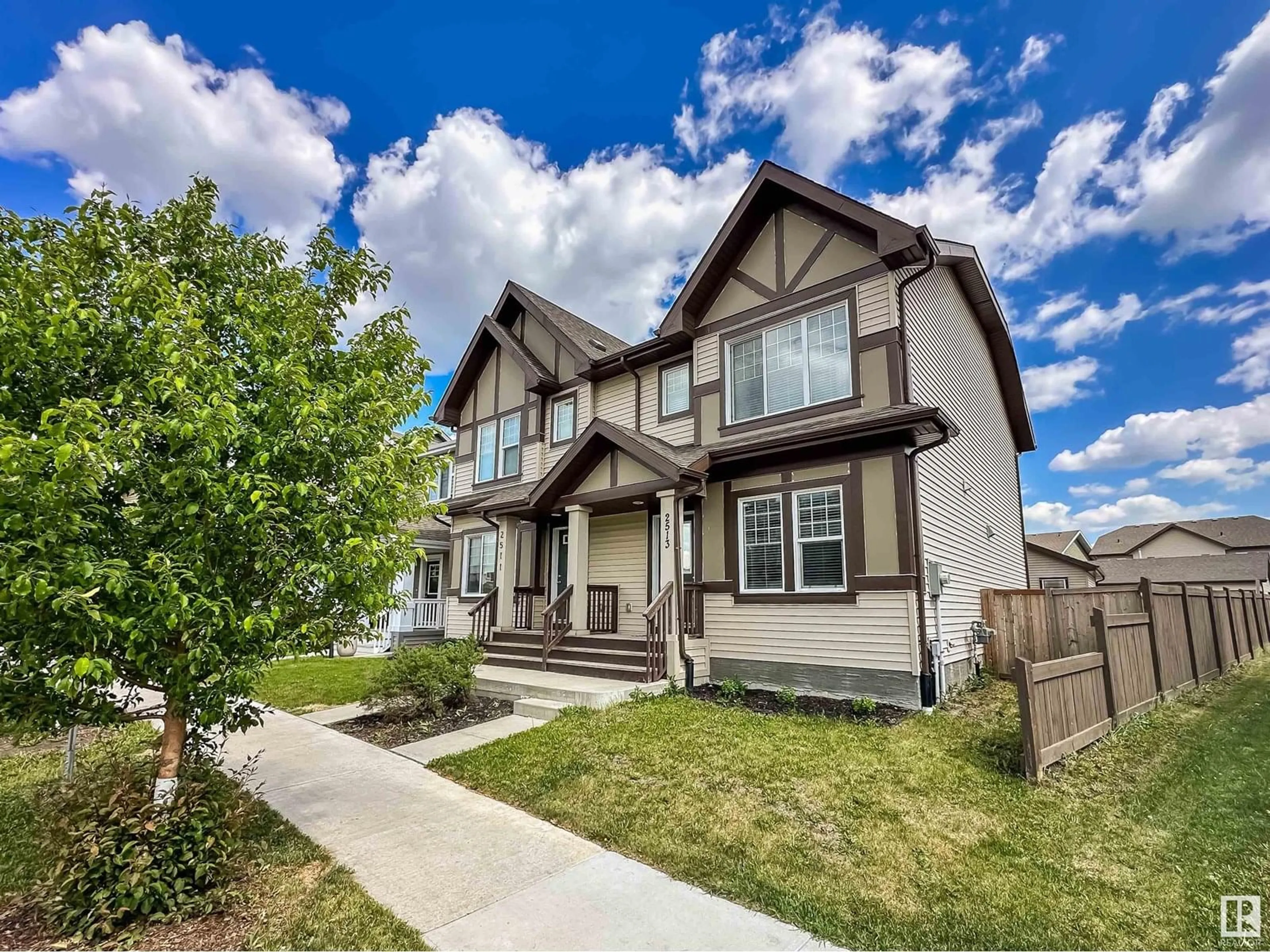 Home with vinyl exterior material, street for 2513 PRICE WY, Edmonton Alberta T6W3W1