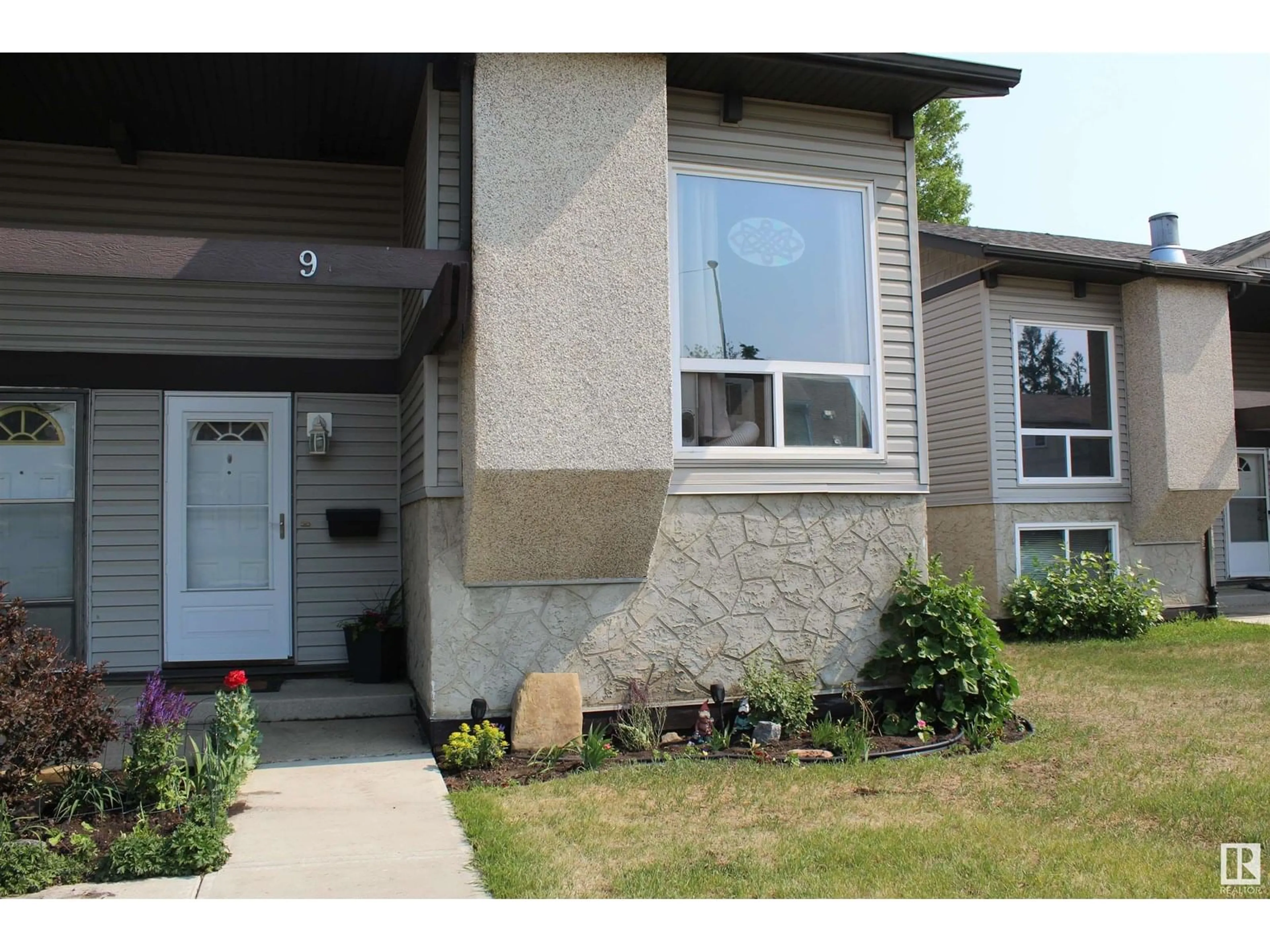 Home with vinyl exterior material, street for NW - 9 NORTHWOODS VG, Edmonton Alberta T5X1T2