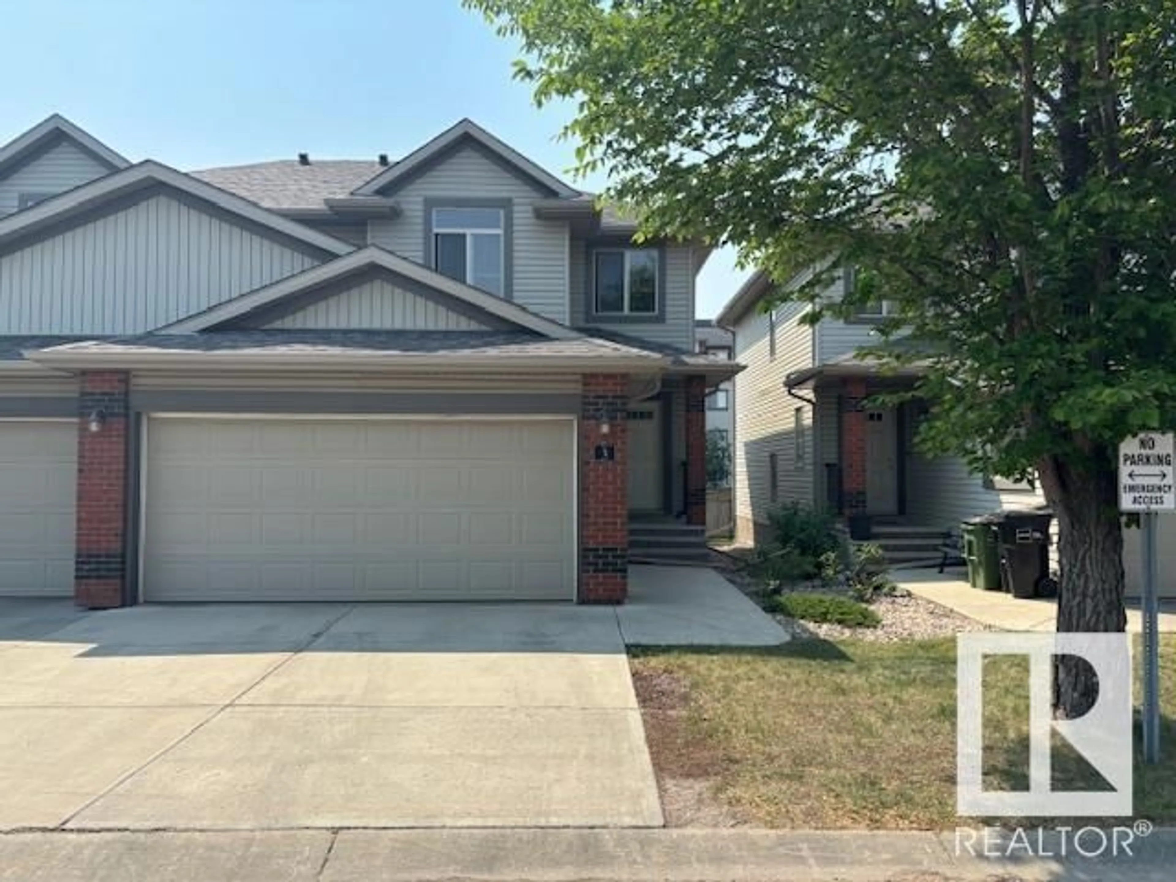 Home with vinyl exterior material, street for #3 - 1128 156 ST, Edmonton Alberta T6R0C9