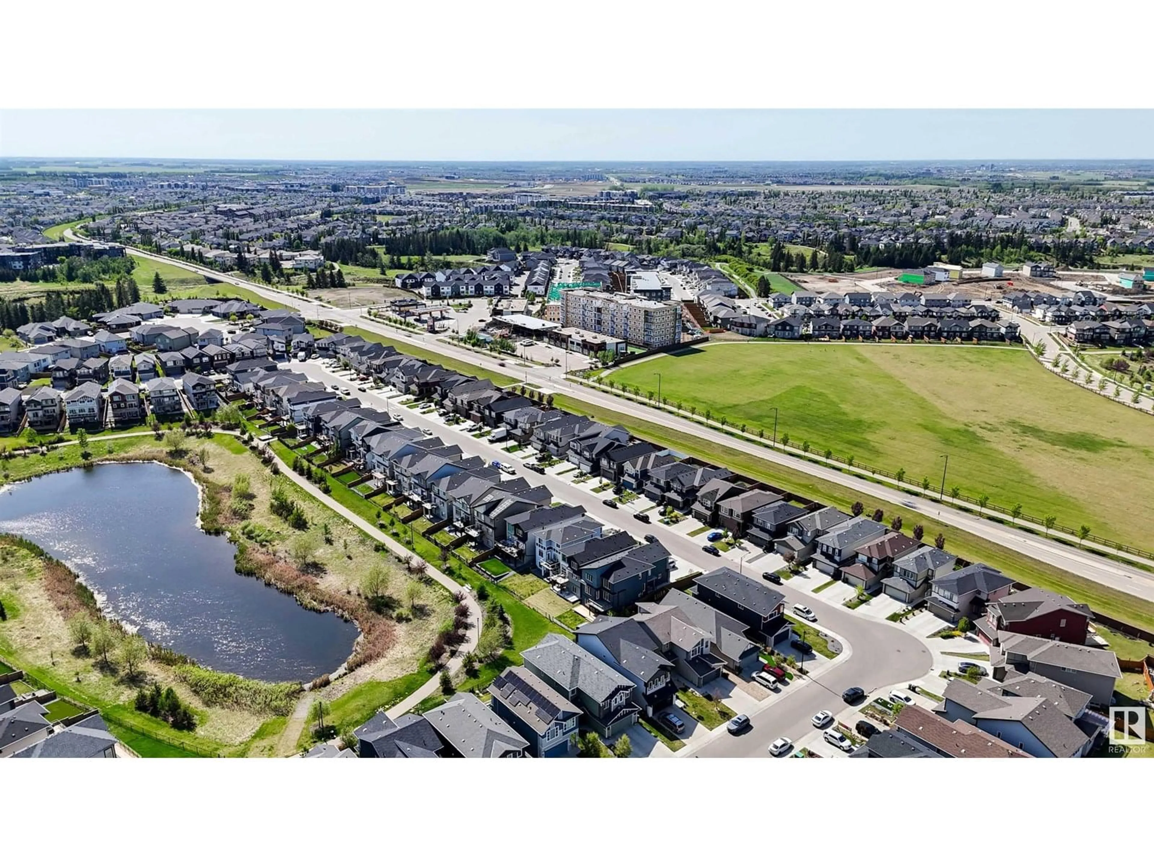 A pic from outside/outdoor area/front of a property/back of a property/a pic from drone, water/lake/river/ocean view for SW - 2743 COLLINS CR, Edmonton Alberta T6W3X4