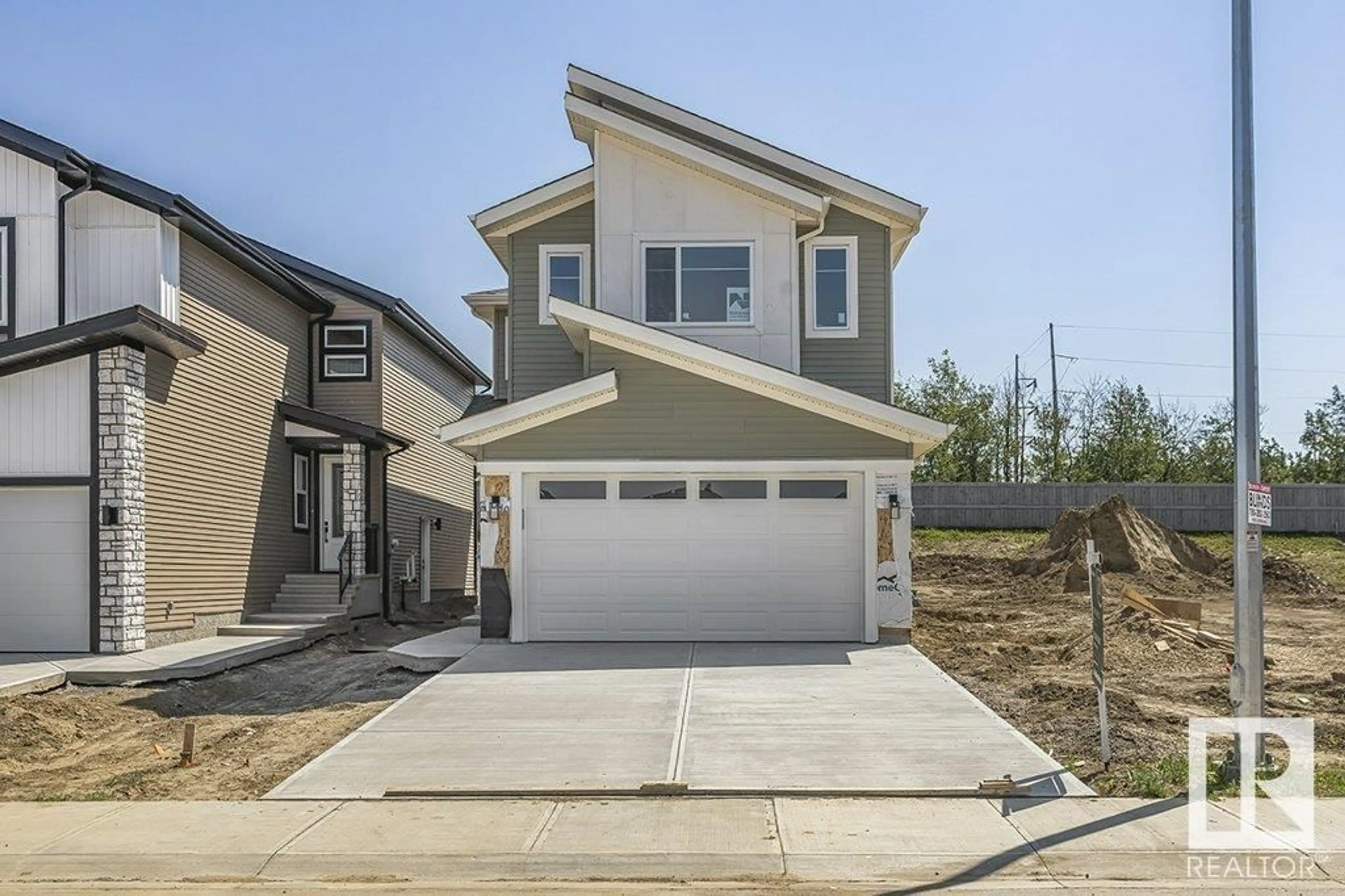 Home with vinyl exterior material, street for 81 SILVERSTONE DR, Stony Plain Alberta T7Y0E8