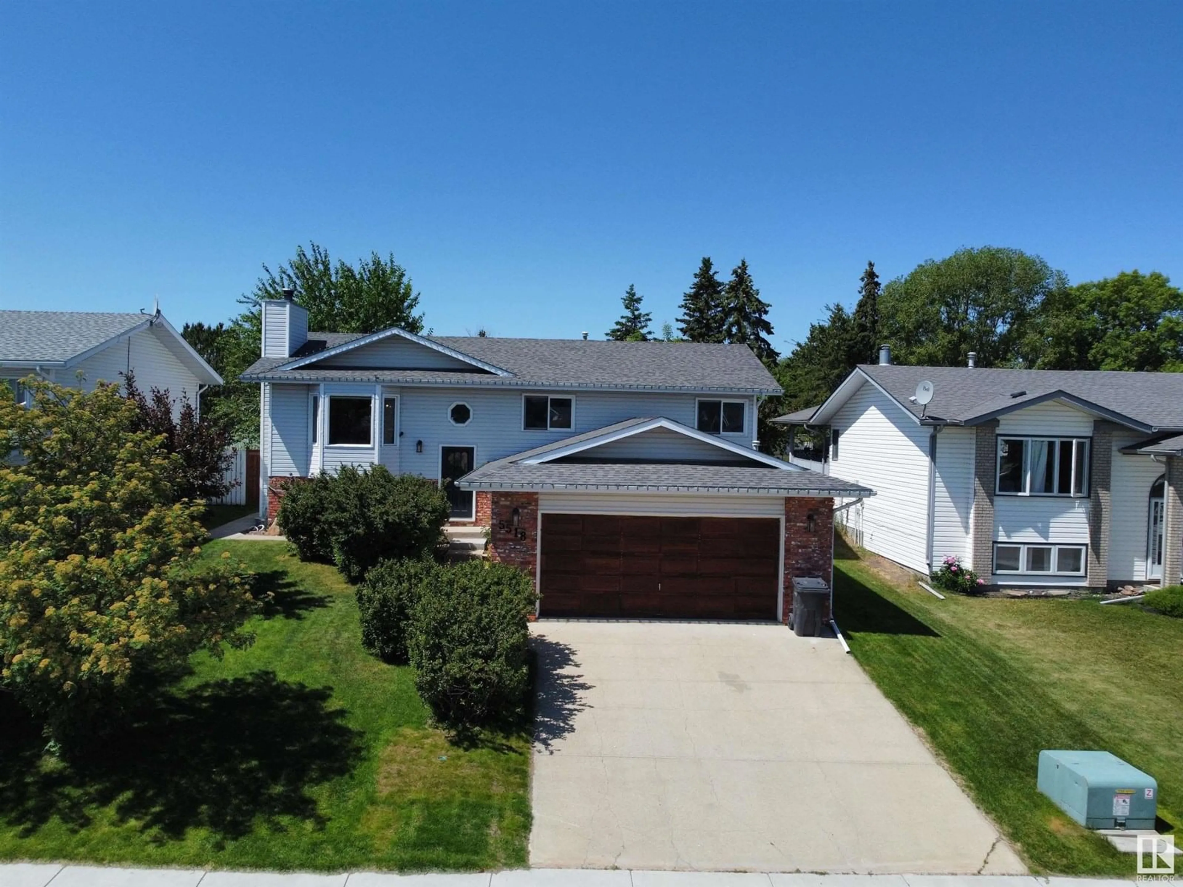 A pic from outside/outdoor area/front of a property/back of a property/a pic from drone, street for 5518 42 ST, Drayton Valley Alberta T7A1A7