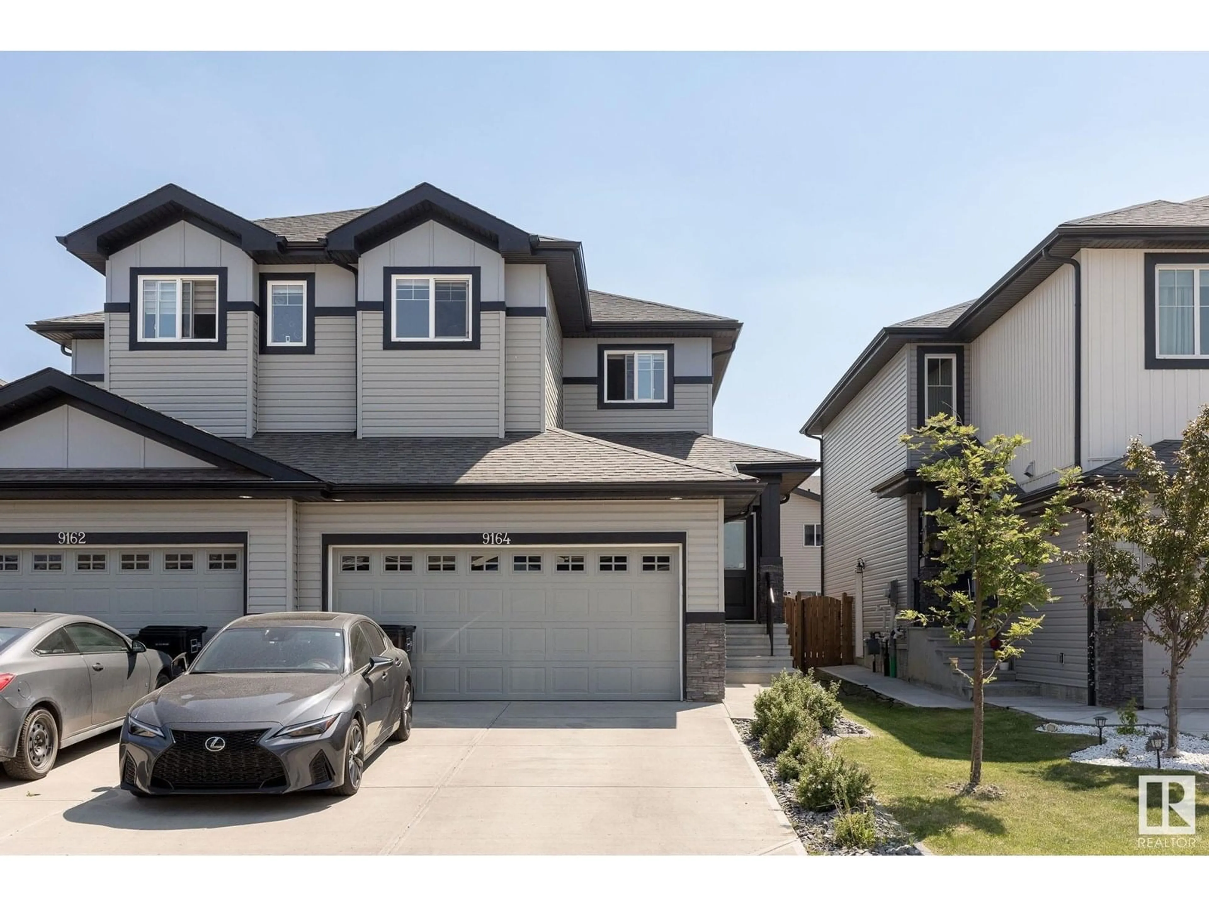 Home with vinyl exterior material, street for 9164 COOPER CR, Edmonton Alberta T6W3K9