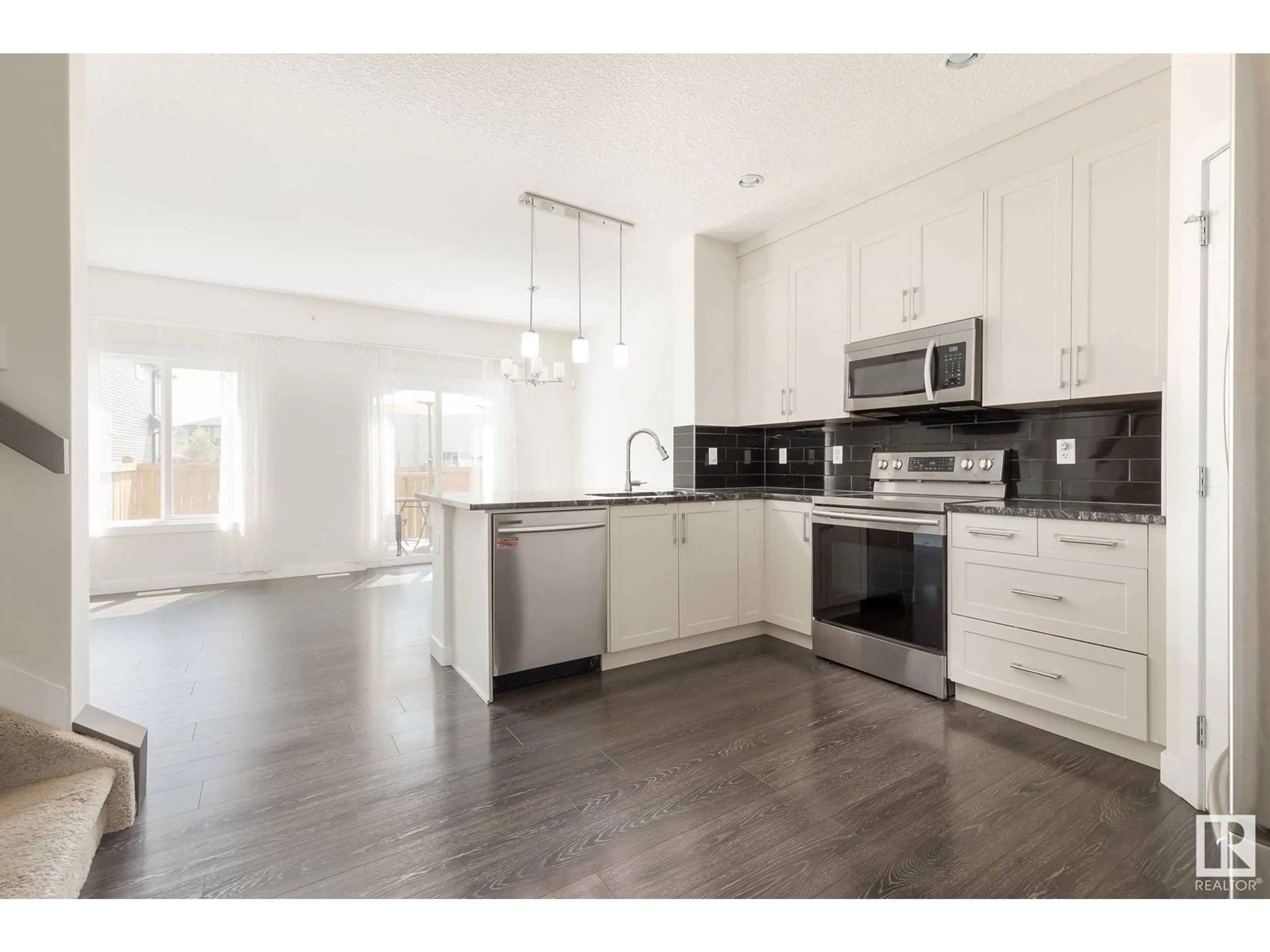 Open concept kitchen, unknown for 9164 COOPER CR, Edmonton Alberta T6W3K9