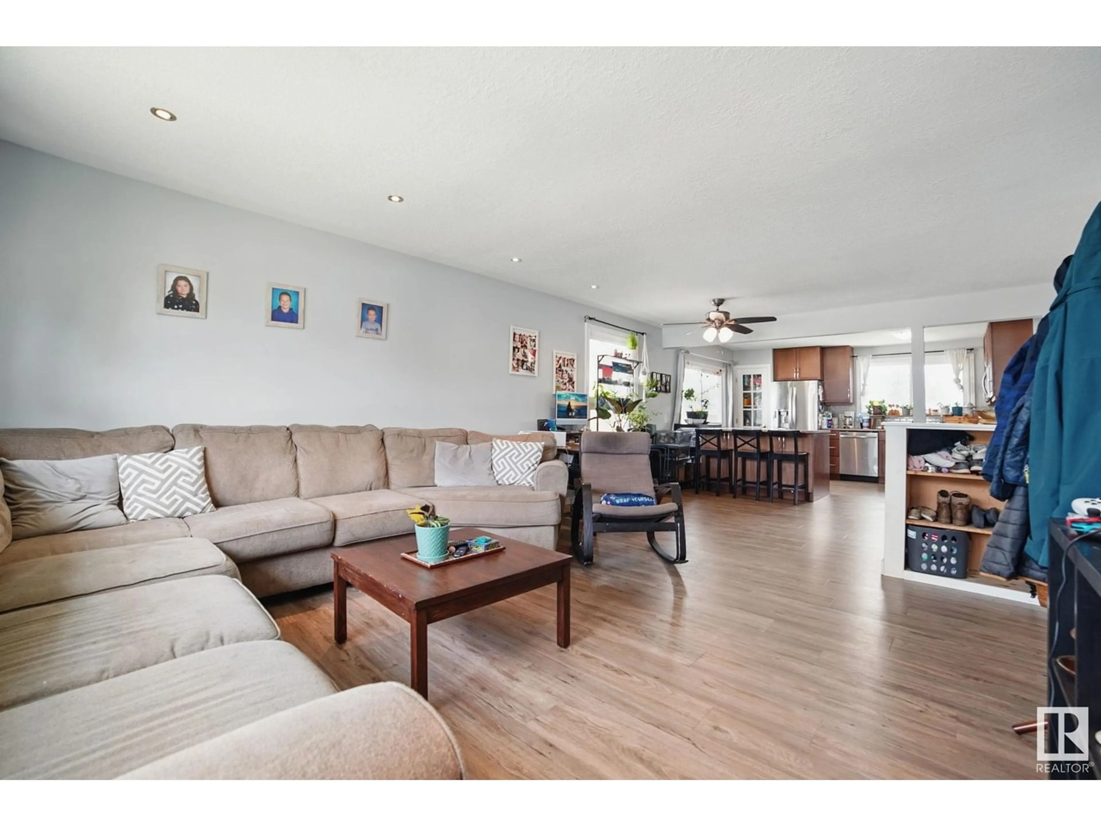 Living room with furniture, wood/laminate floor for 4013 37 AV, Leduc Alberta T9E6E1