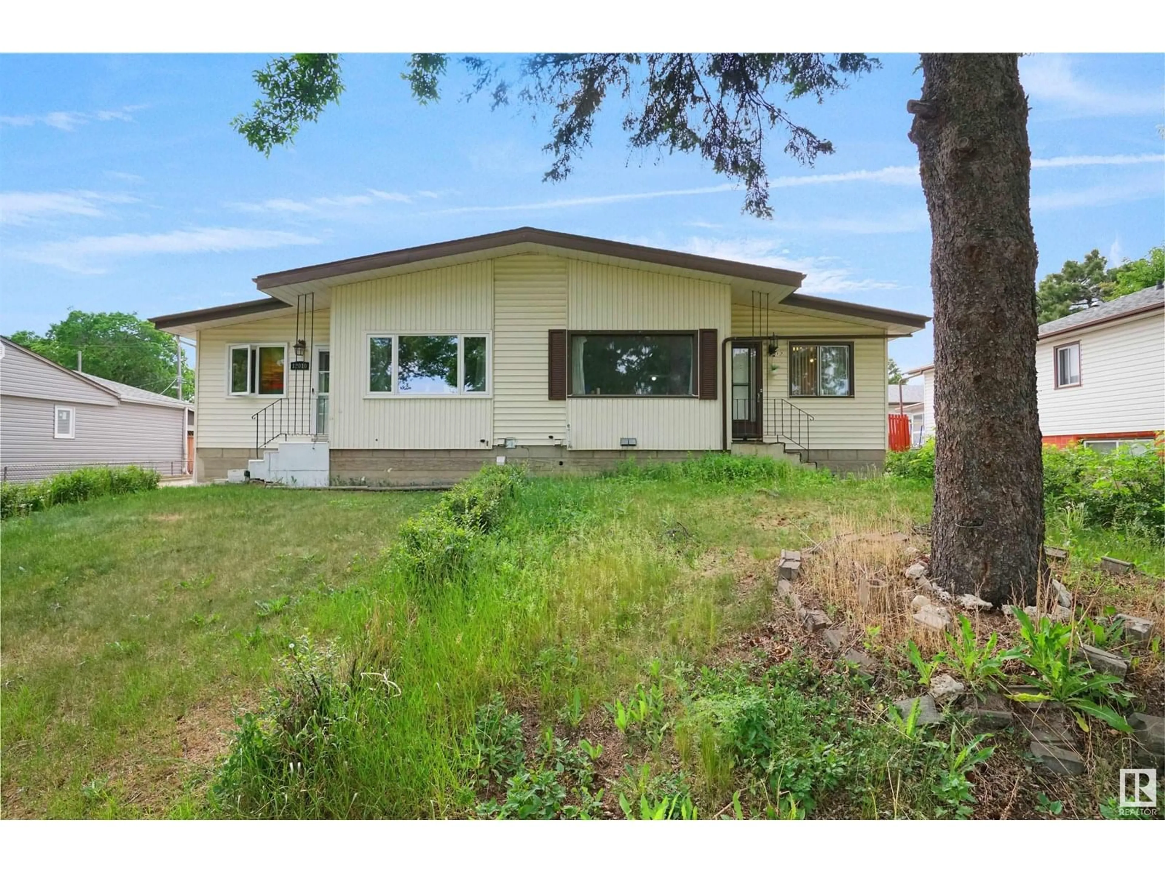 Home with vinyl exterior material, unknown for 12012 49 ST, Edmonton Alberta T5W3A4