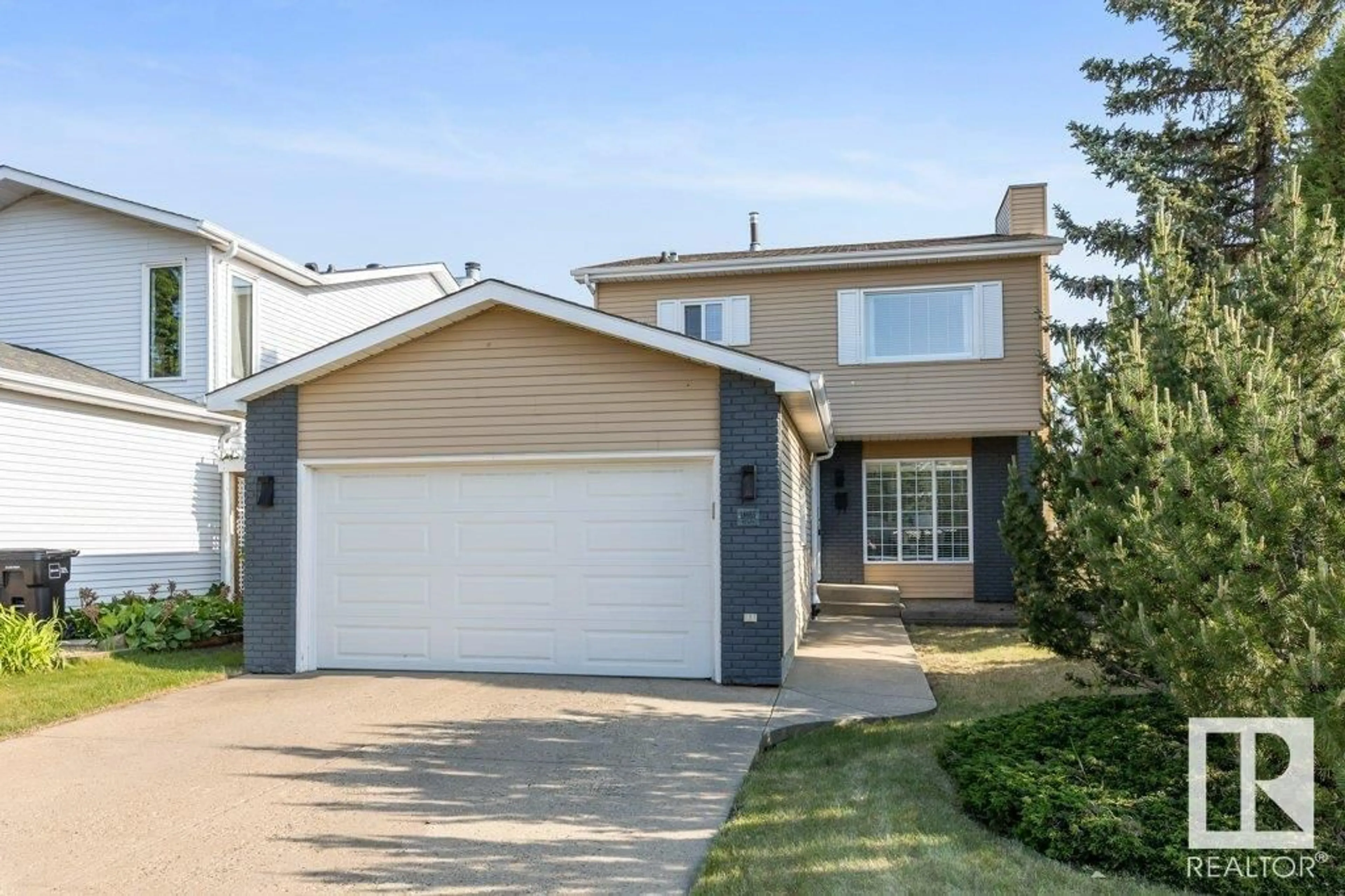 Home with vinyl exterior material, street for 18955 82 AV, Edmonton Alberta T5T5C6
