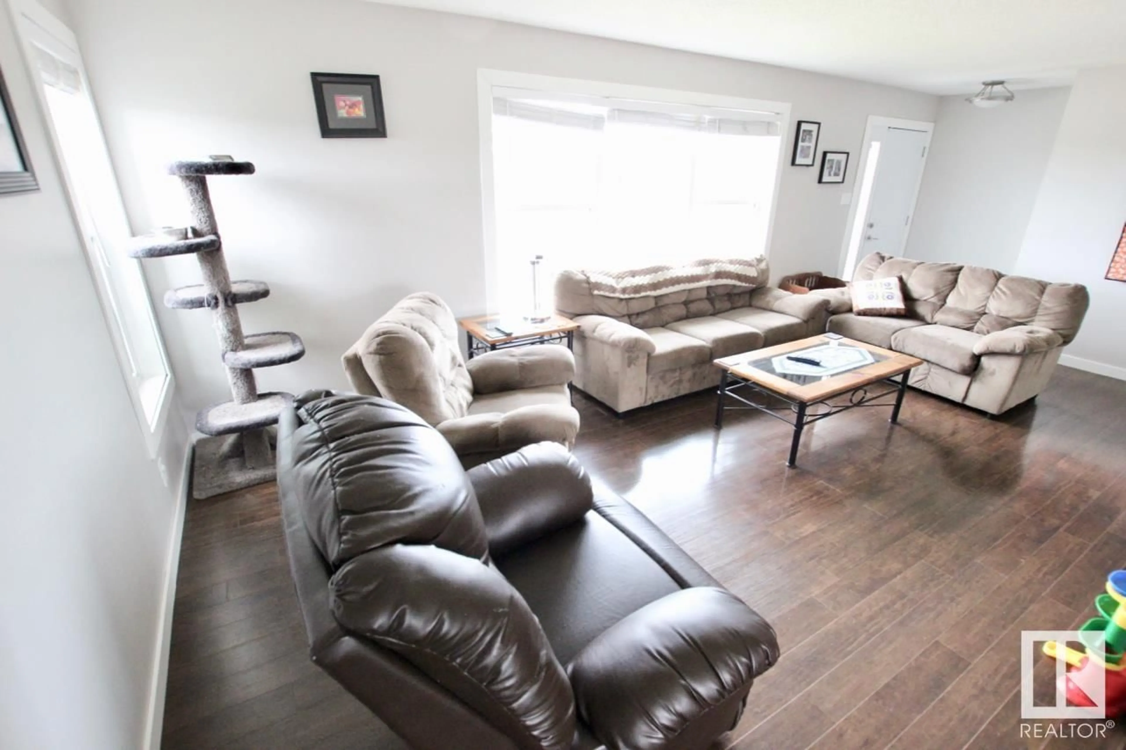 Living room with furniture, wood/laminate floor for 5209 FIRST AV, Boyle Alberta T0A0M0