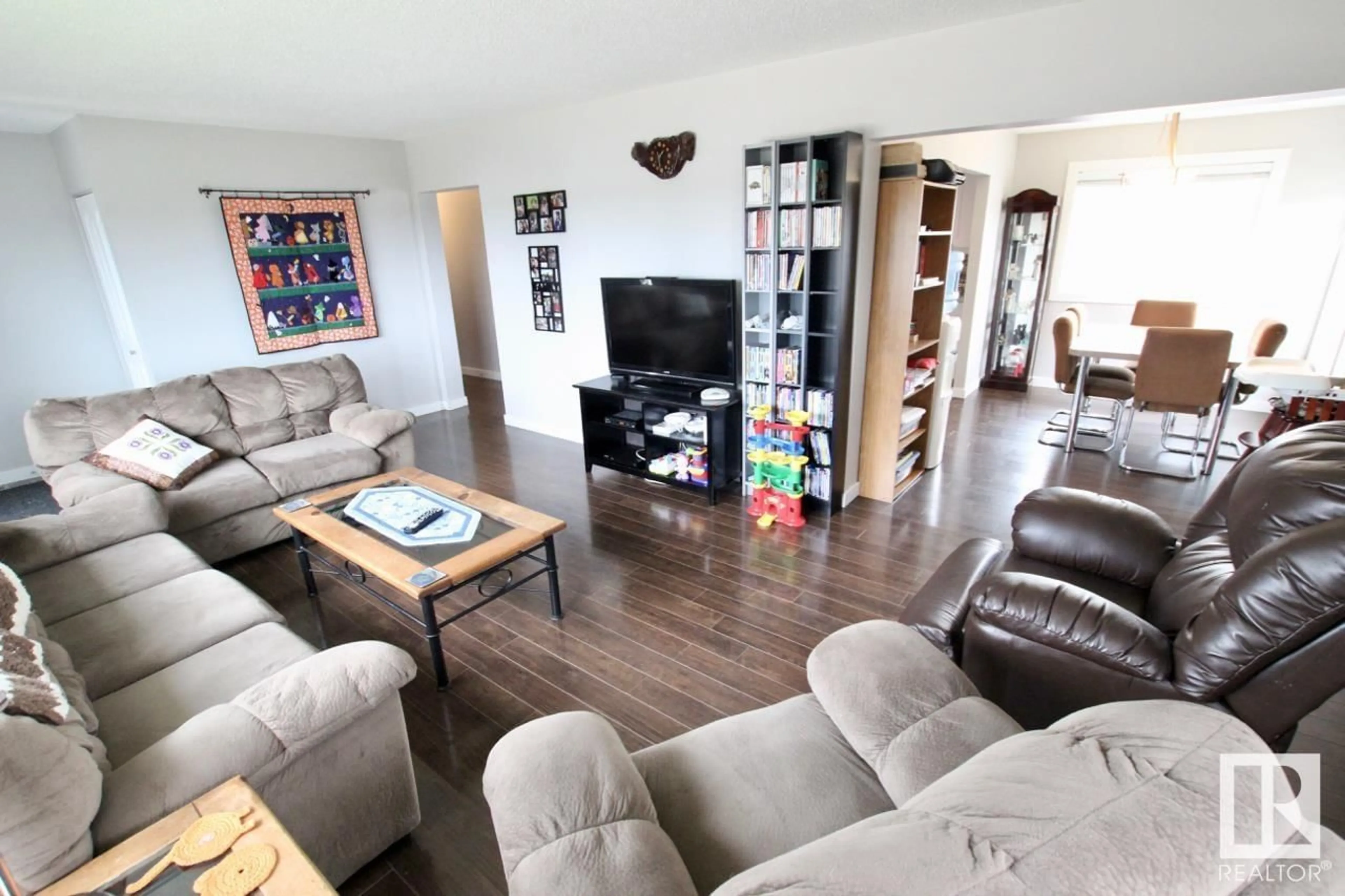 Living room with furniture, wood/laminate floor for 5209 FIRST AV, Boyle Alberta T0A0M0