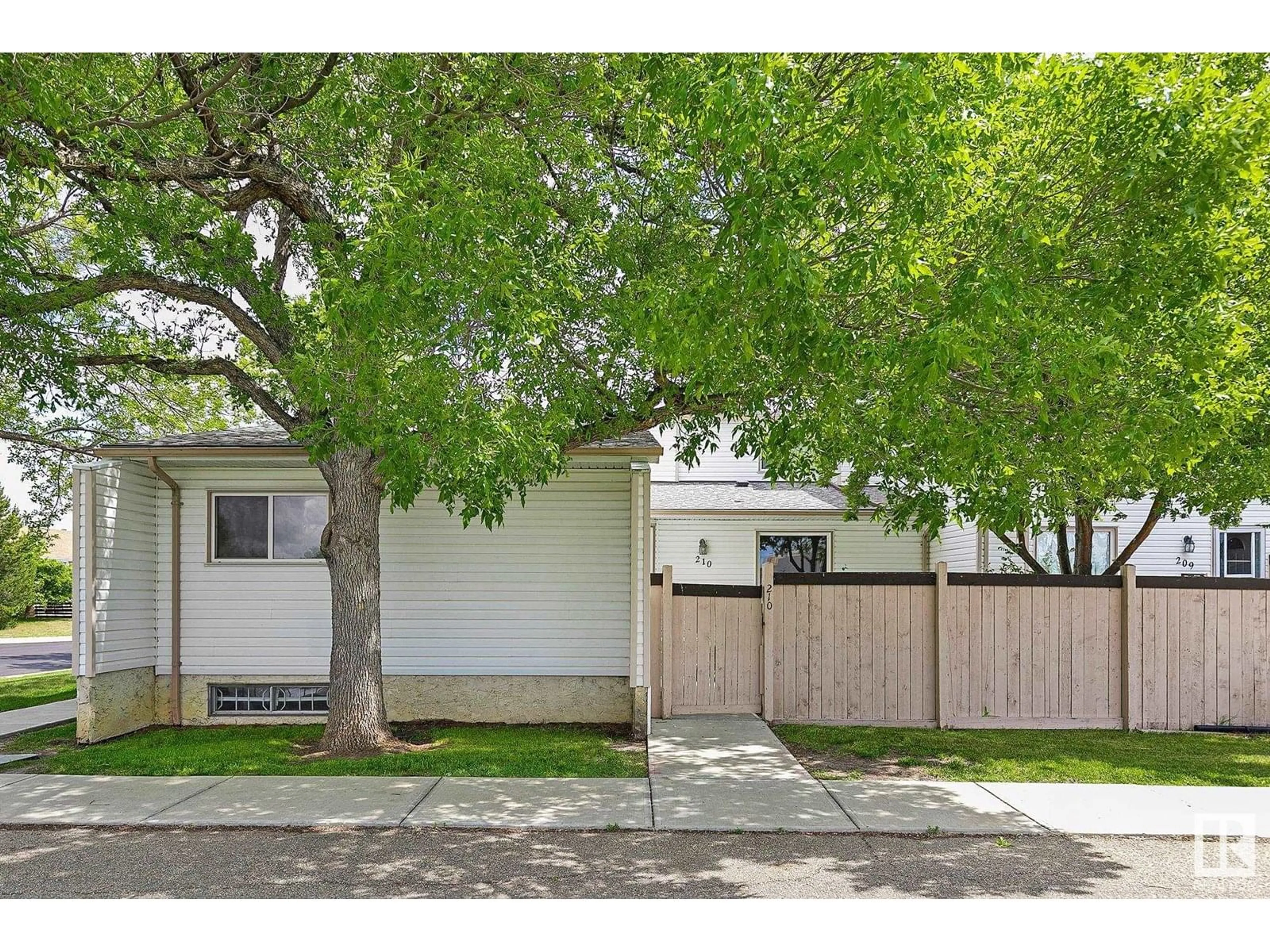 Home with vinyl exterior material, street for 210 MARLBOROUGH PL, Edmonton Alberta T5T1Y6
