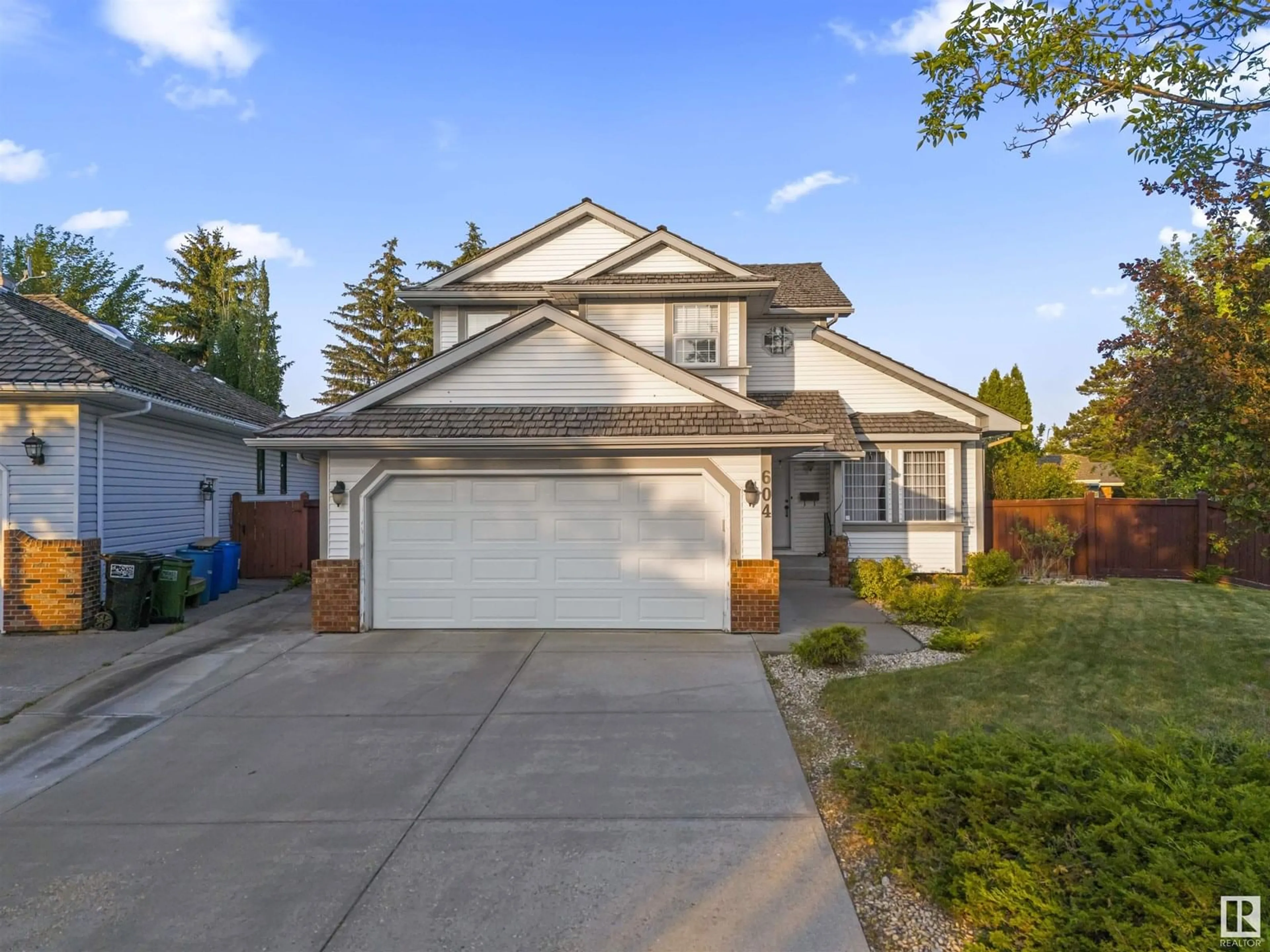 Home with vinyl exterior material, street for 604 BURGESS CL, Edmonton Alberta T6R1Z7