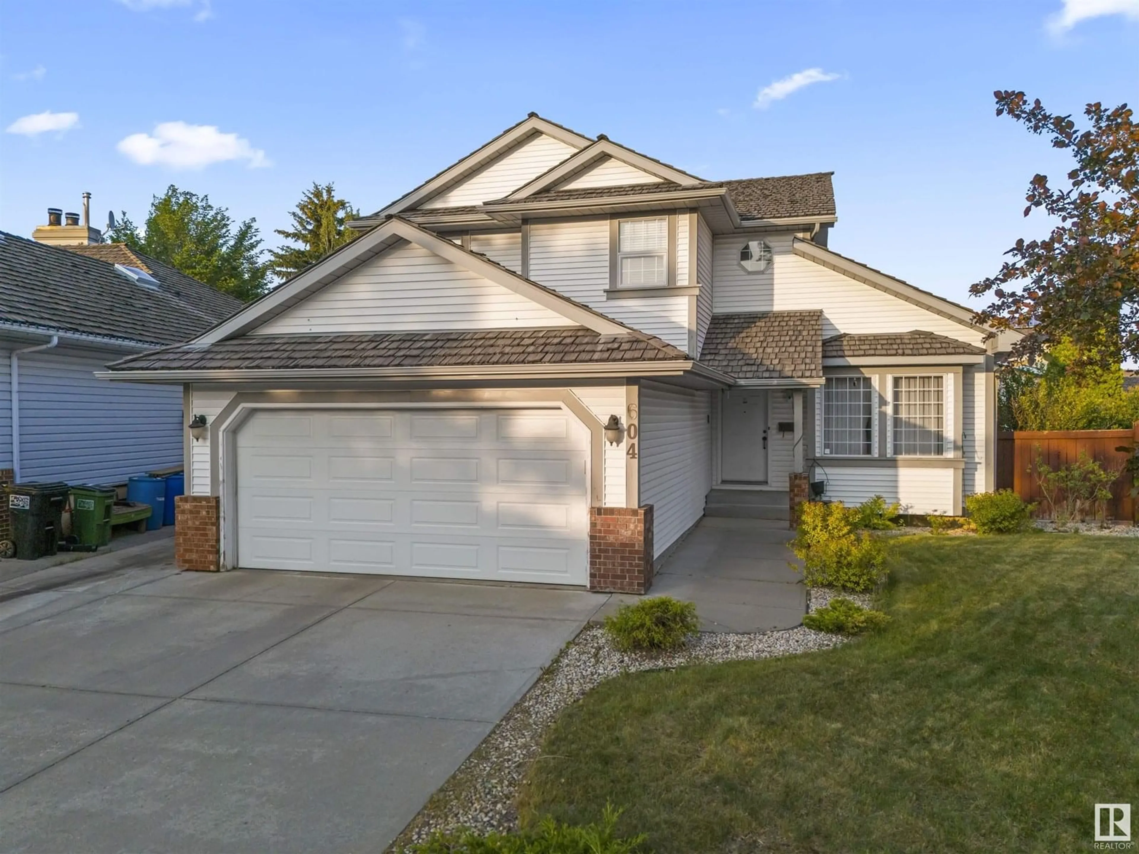 Home with vinyl exterior material, street for 604 BURGESS CL, Edmonton Alberta T6R1Z7