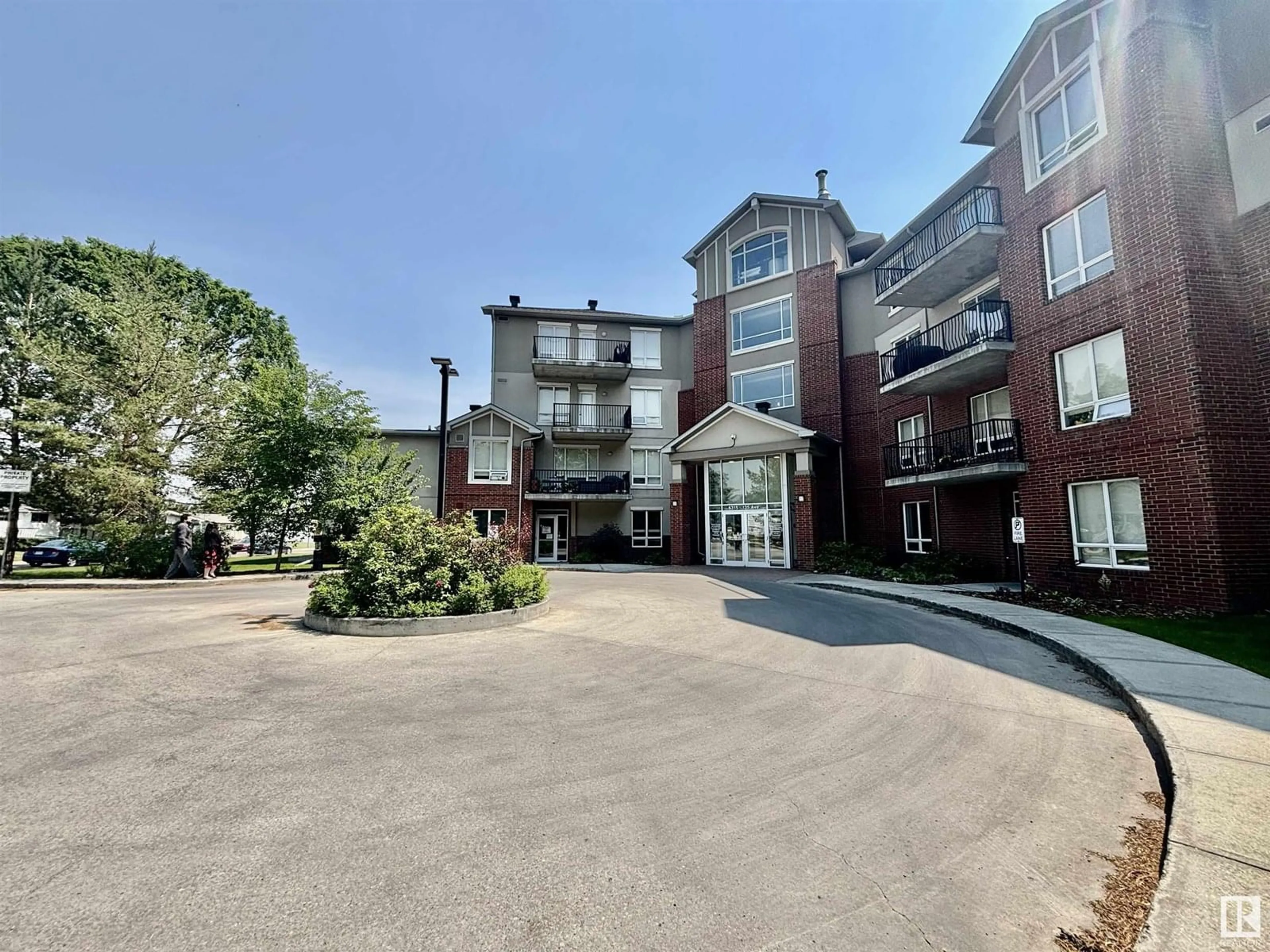 A pic from outside/outdoor area/front of a property/back of a property/a pic from drone, unknown for #307 - 6315 135 AV, Edmonton Alberta T5A5J7