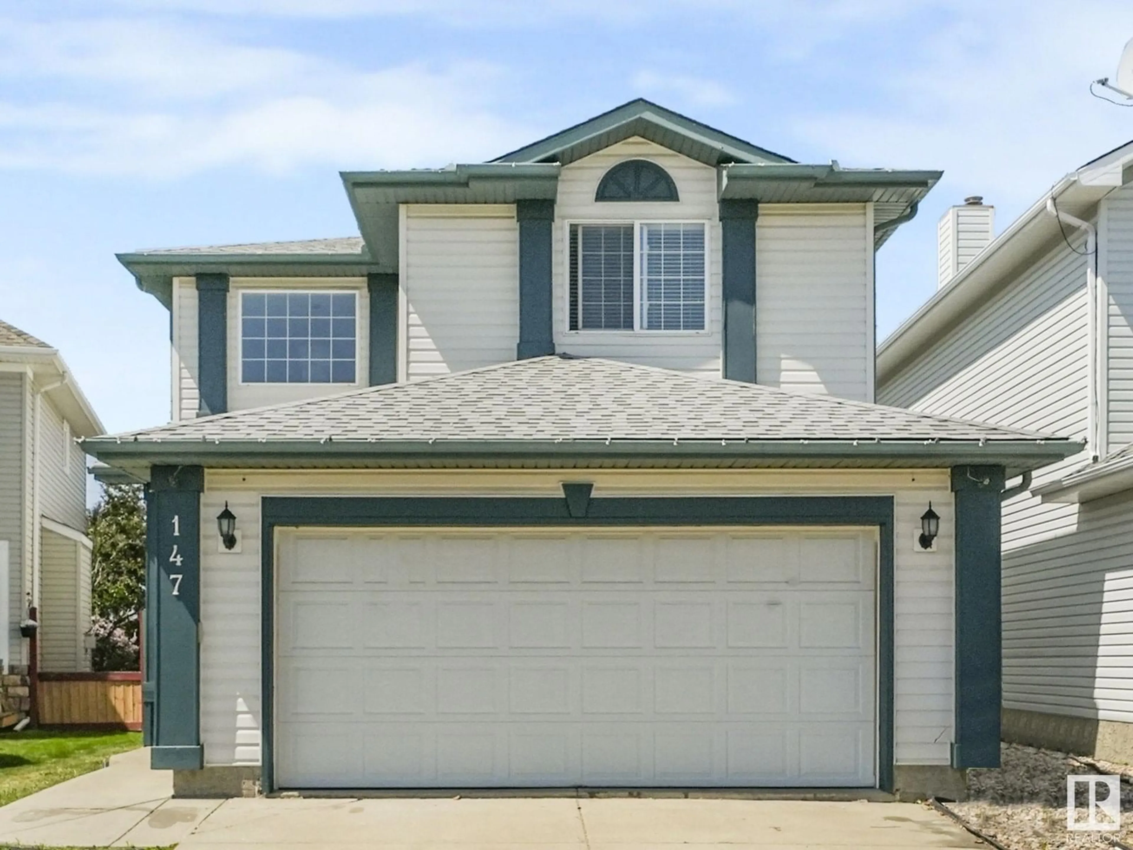 Home with vinyl exterior material, street for 147 WARD CR, Edmonton Alberta T6T1M6