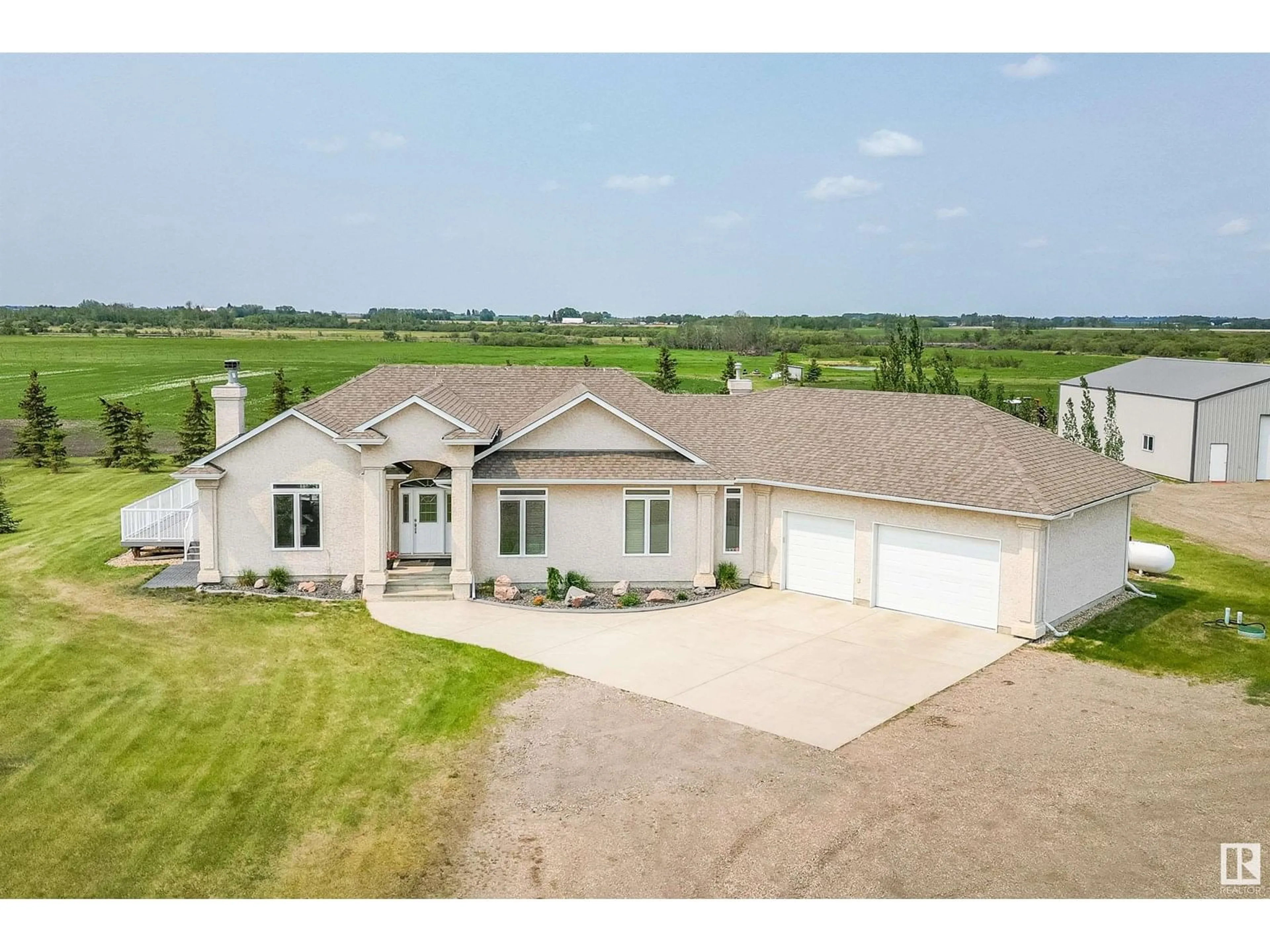 A pic from outside/outdoor area/front of a property/back of a property/a pic from drone, unknown for 55116 RGE RD 234, Rural Sturgeon County Alberta T8T2A7