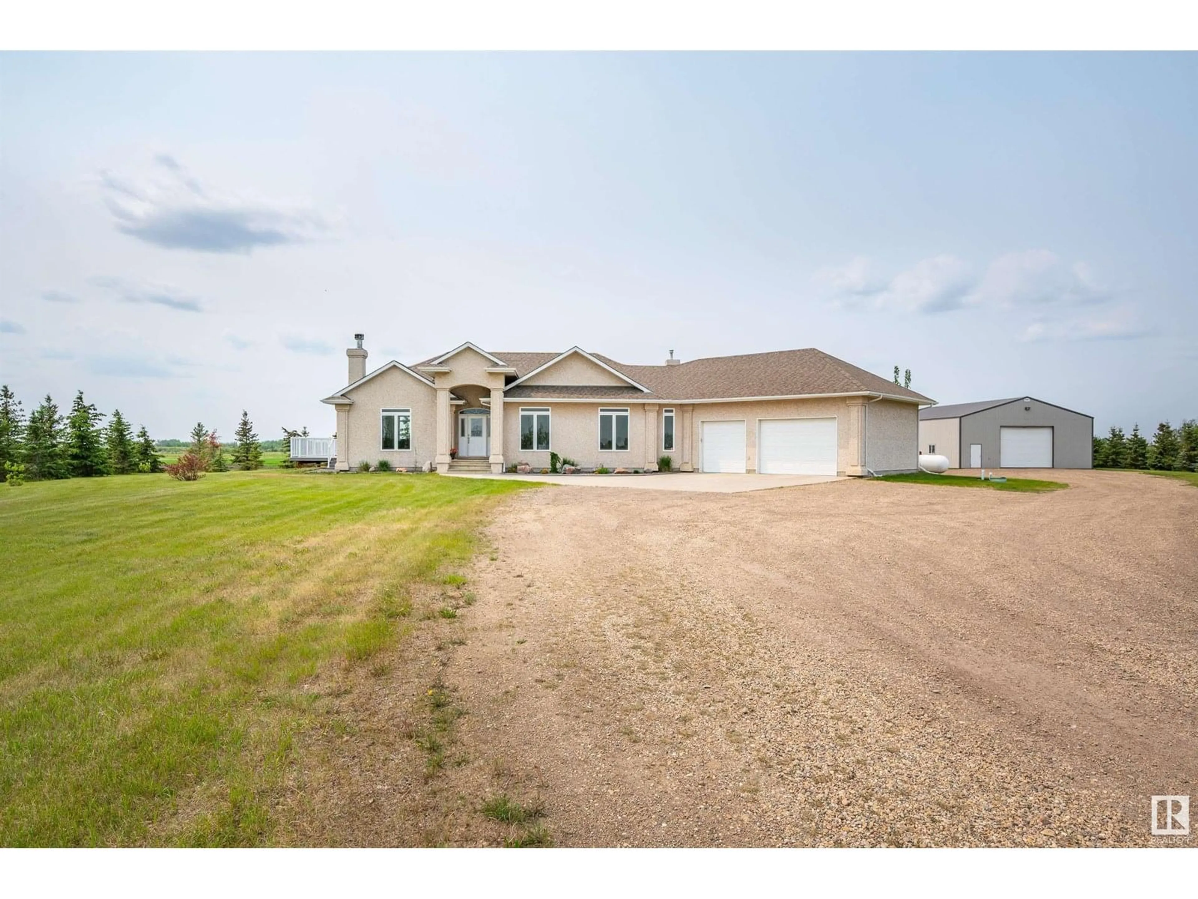 A pic from outside/outdoor area/front of a property/back of a property/a pic from drone, building for 55116 RGE RD 234, Rural Sturgeon County Alberta T8T2A7