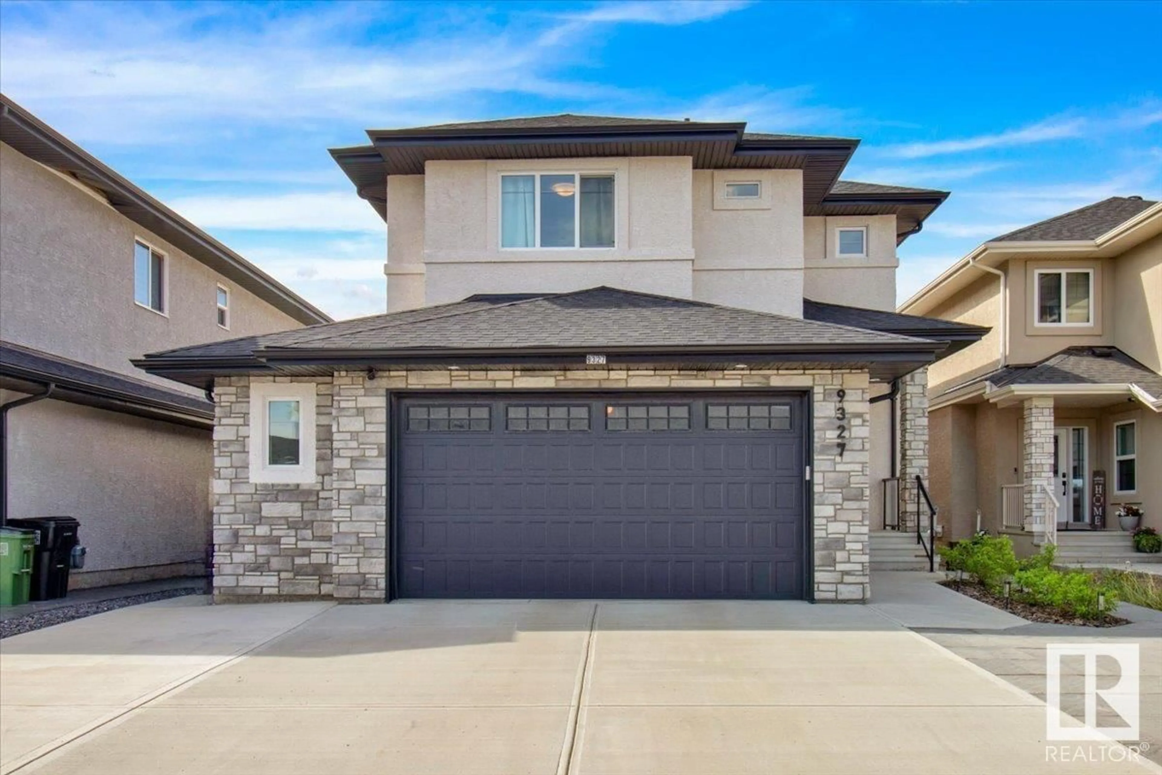Home with brick exterior material, street for 9327 181 AV, Edmonton Alberta T5Z0K2