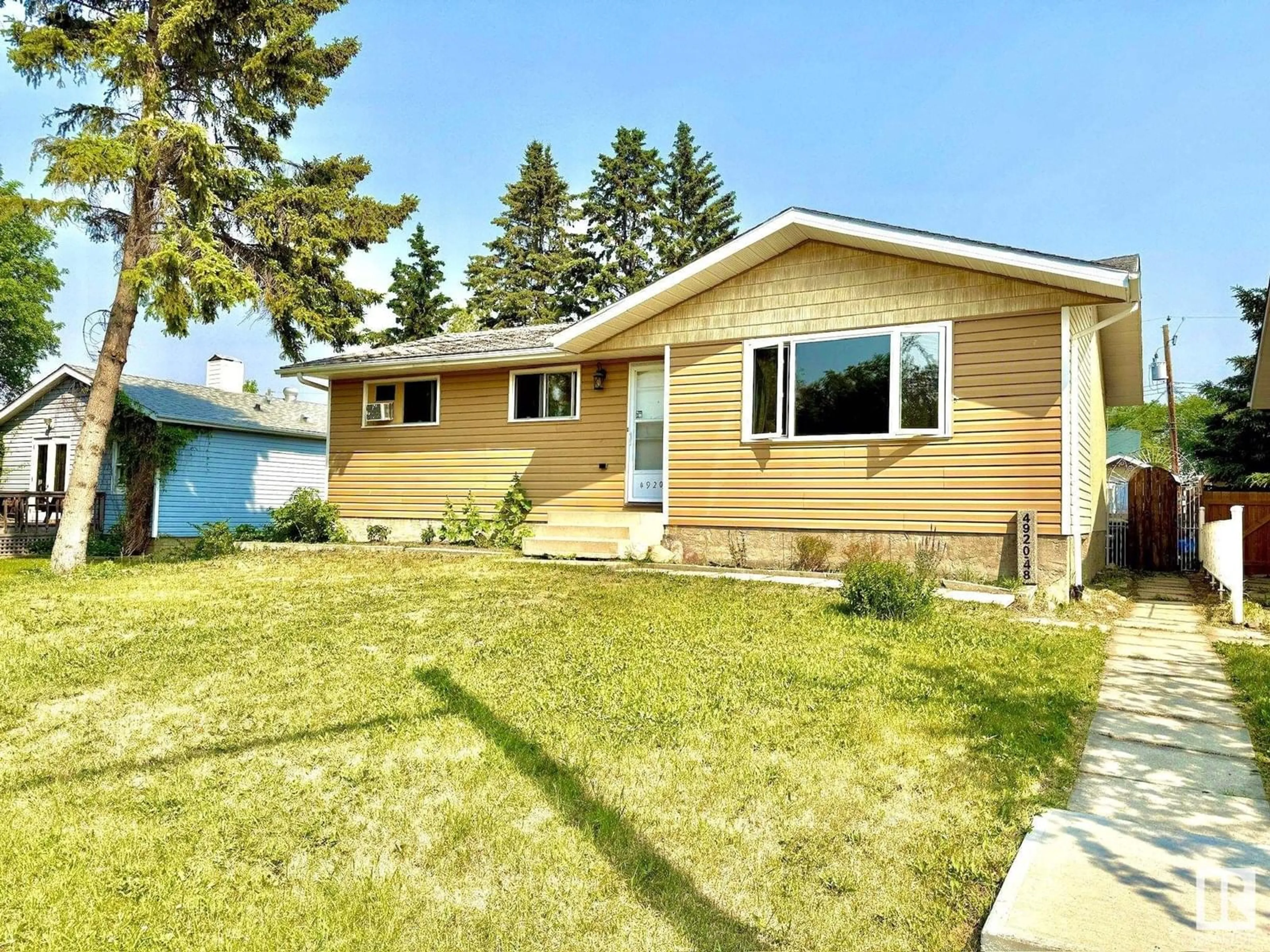 Home with vinyl exterior material, street for 4920 48 AV, Bon Accord Alberta T0A0K0