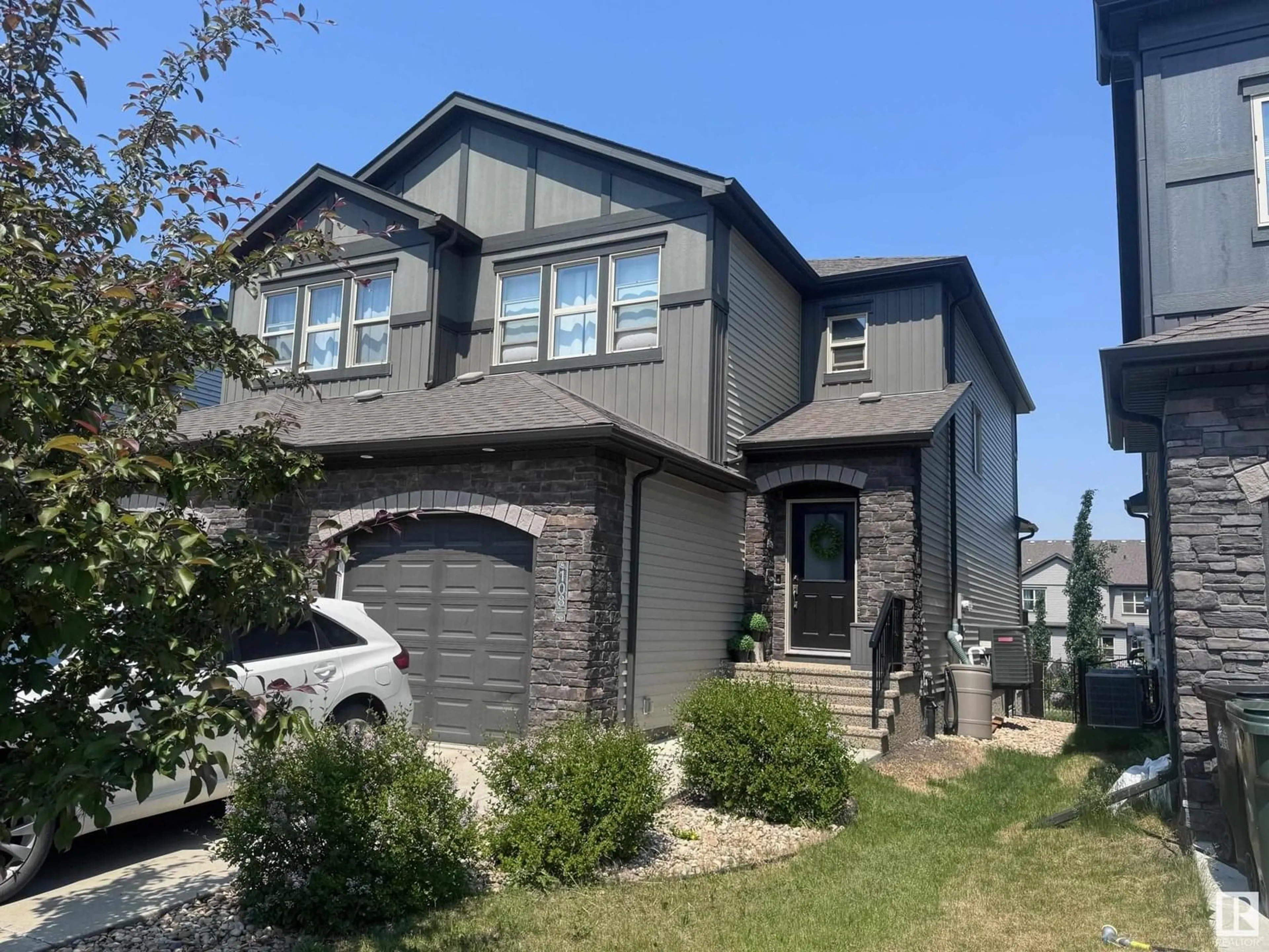 Home with vinyl exterior material, street for 108 GREENBURY CL, Spruce Grove Alberta T7X0M1