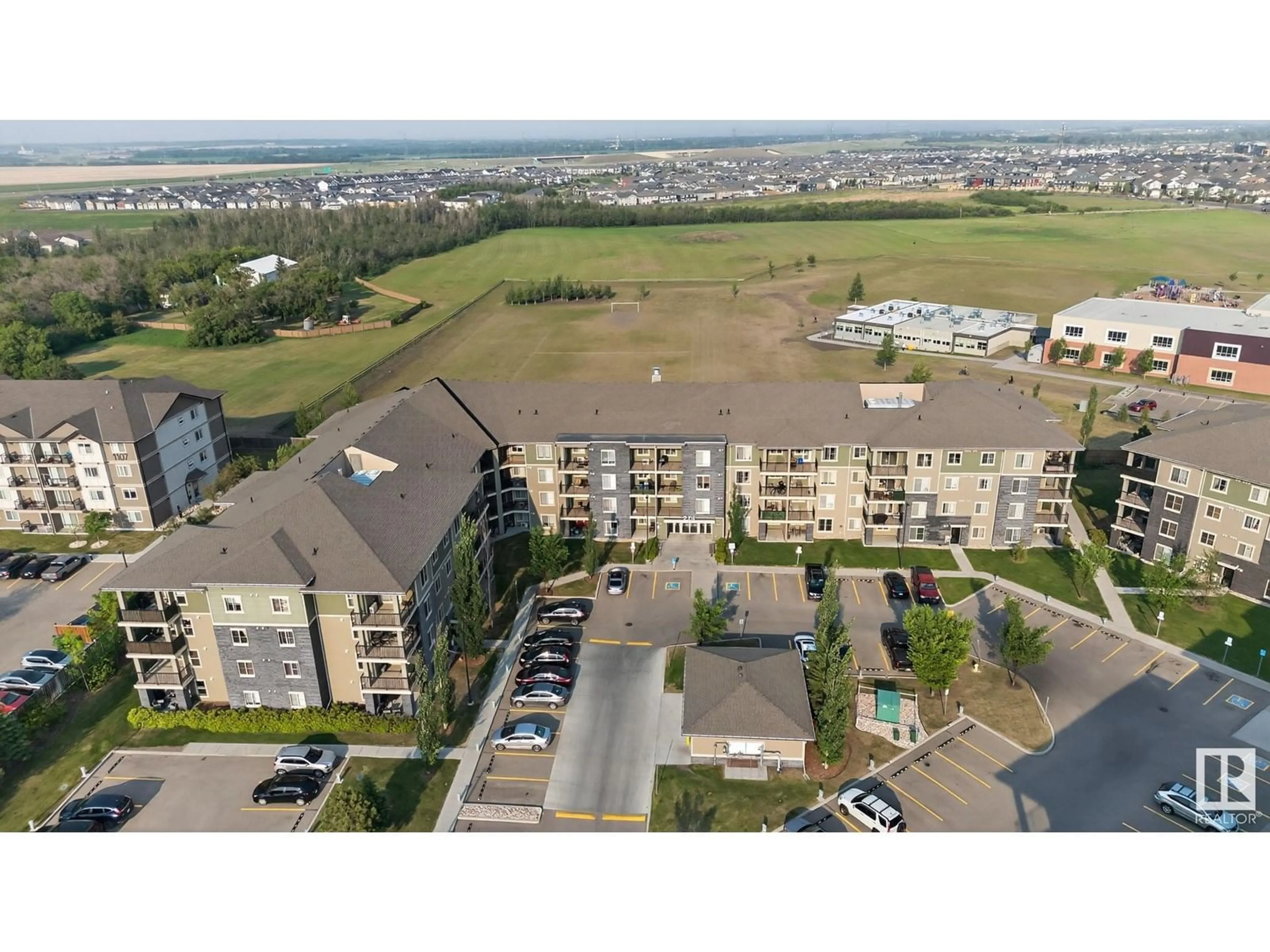 A pic from outside/outdoor area/front of a property/back of a property/a pic from drone, unknown for 274 - 422 MCCONACHIE DR, Edmonton Alberta T5Y3N4