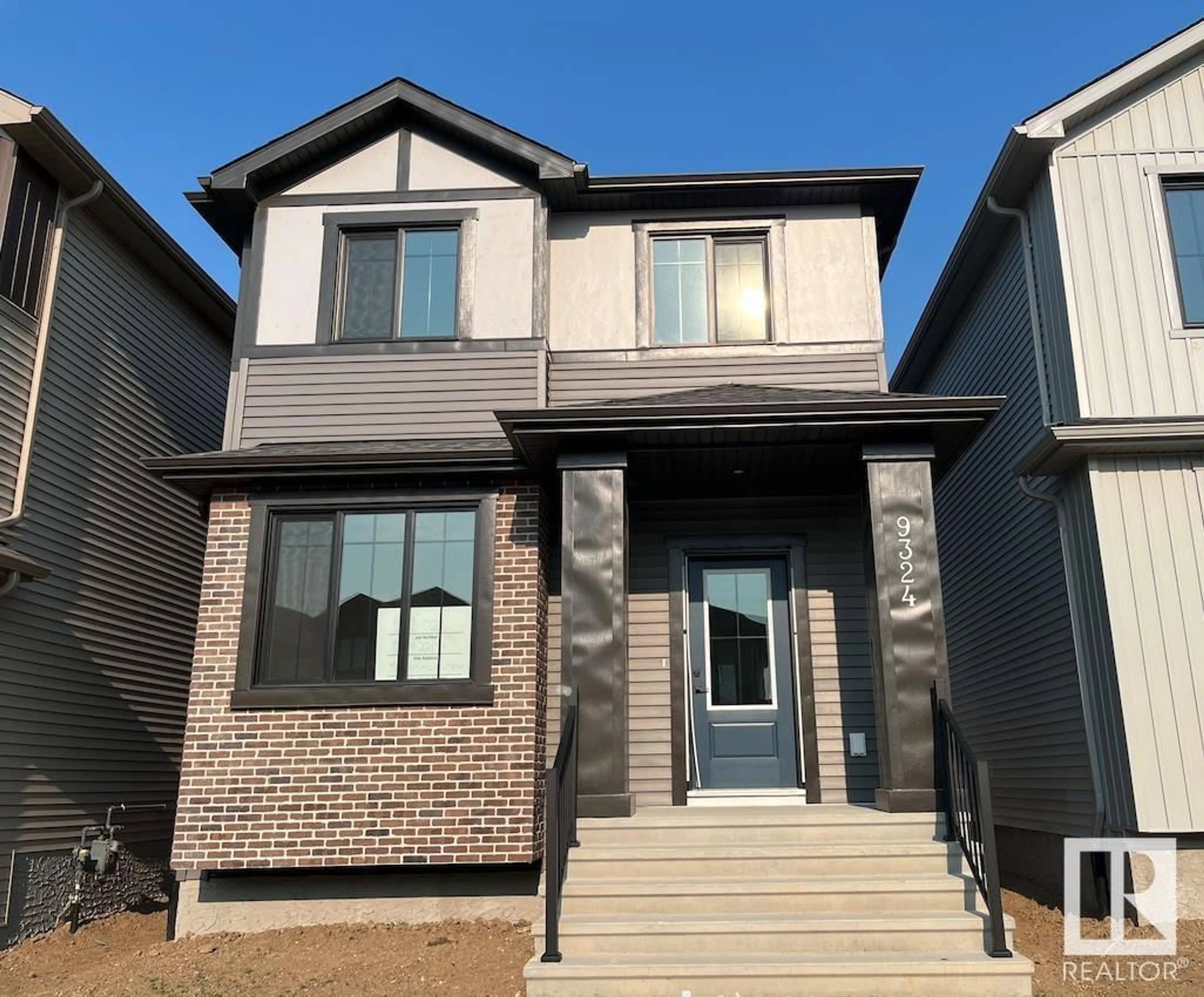 Home with brick exterior material, street for NW - 9324 221 ST, Edmonton Alberta T5T6C9
