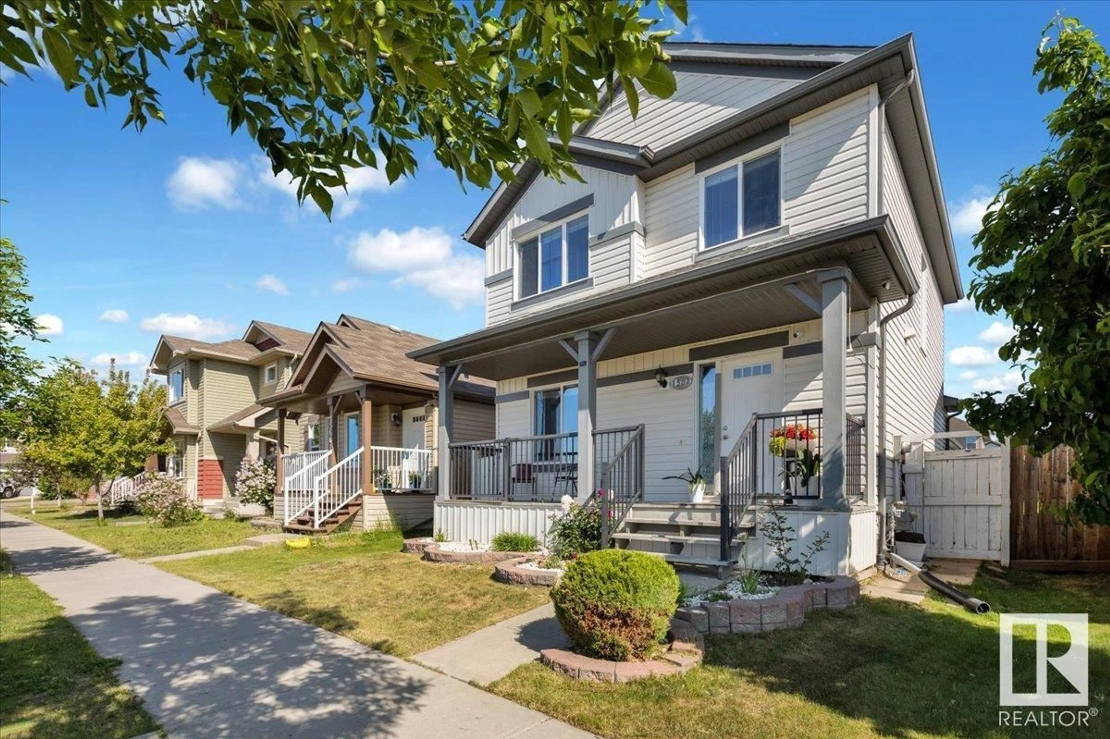 Home with vinyl exterior material, street for 1562 34A AV, Edmonton Alberta T6T0N1