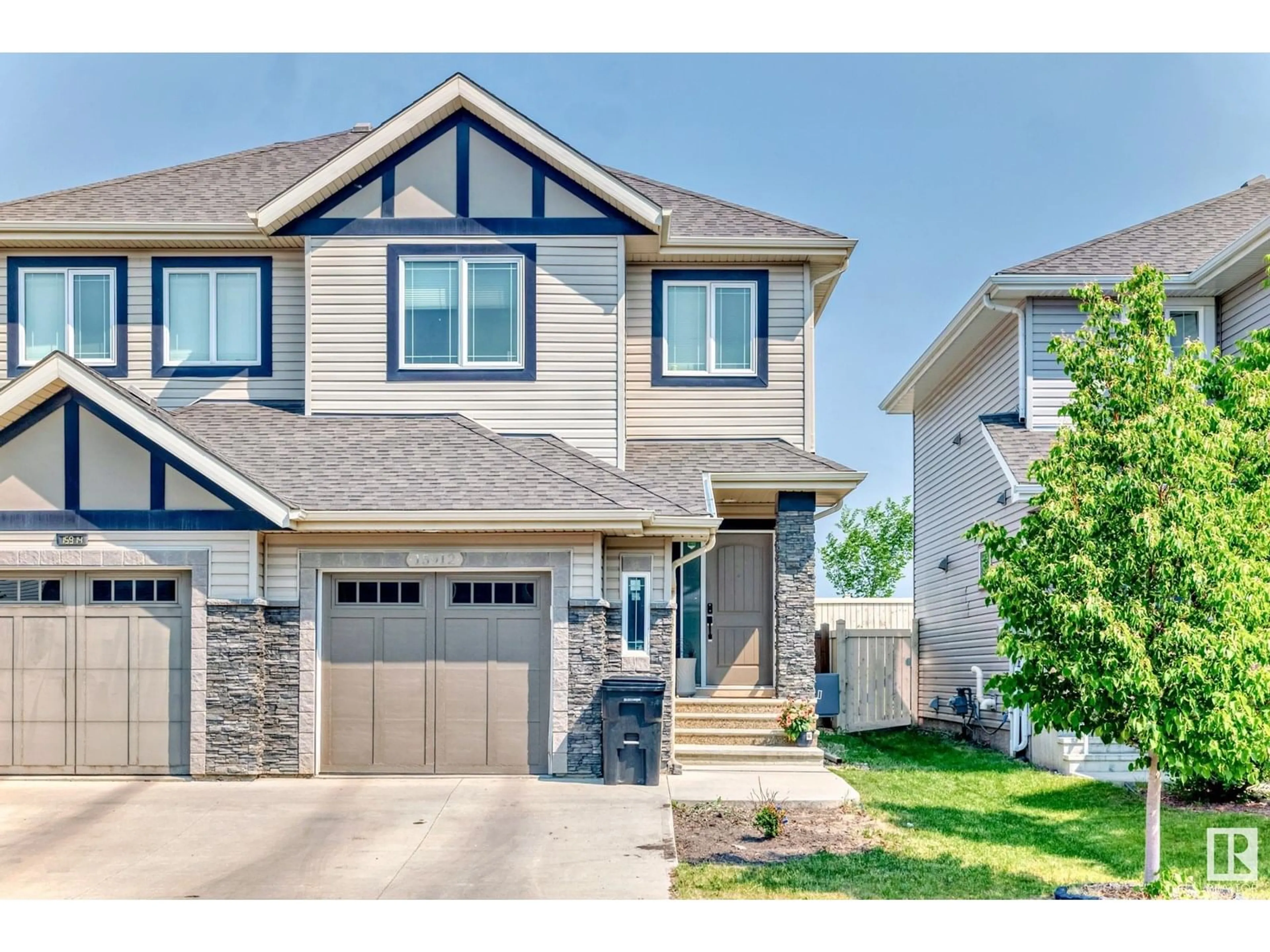 Home with vinyl exterior material, street for SW - 15912 10 AV, Edmonton Alberta T6W2H2