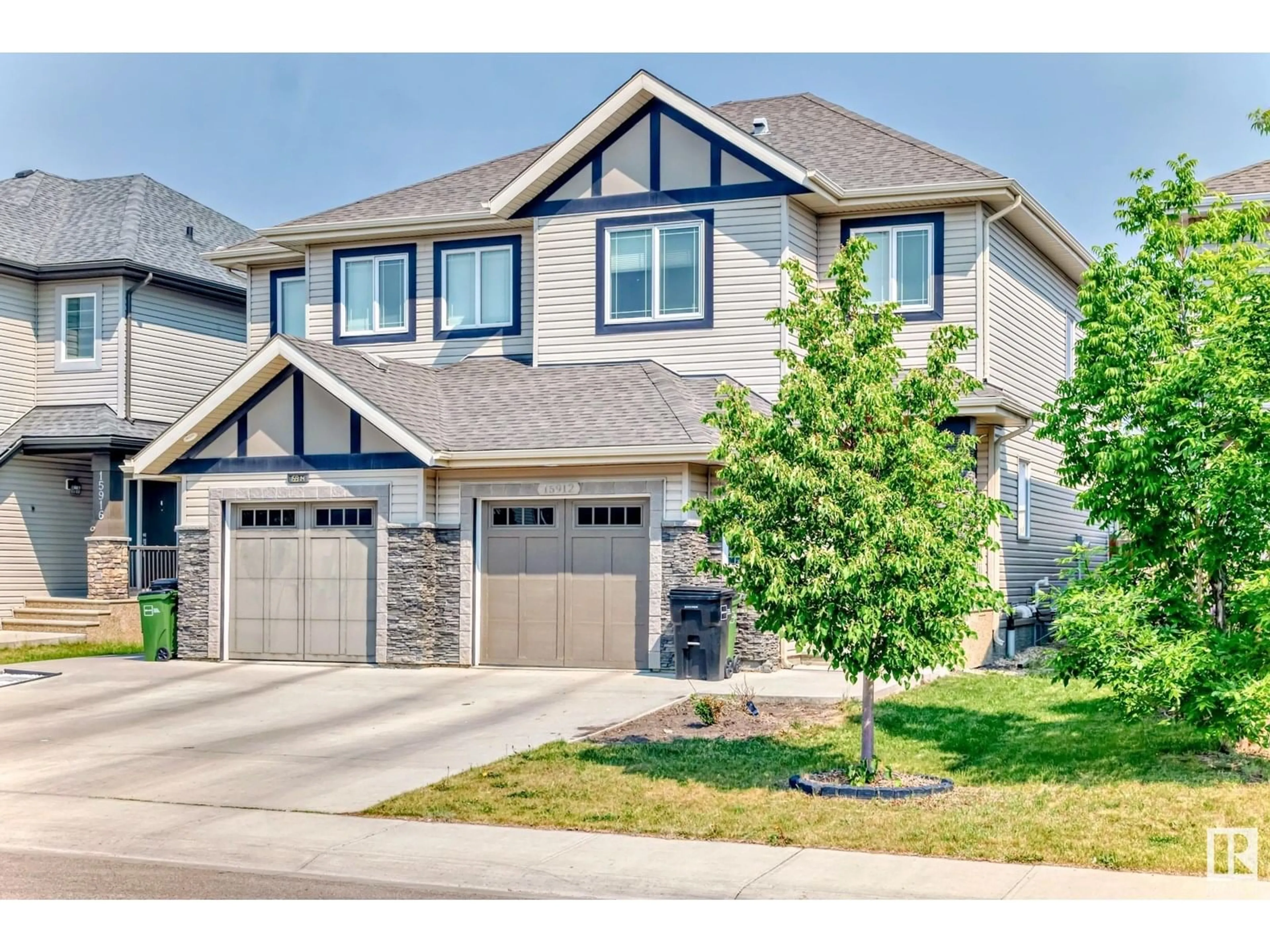 Home with vinyl exterior material, street for SW - 15912 10 AV, Edmonton Alberta T6W2H2