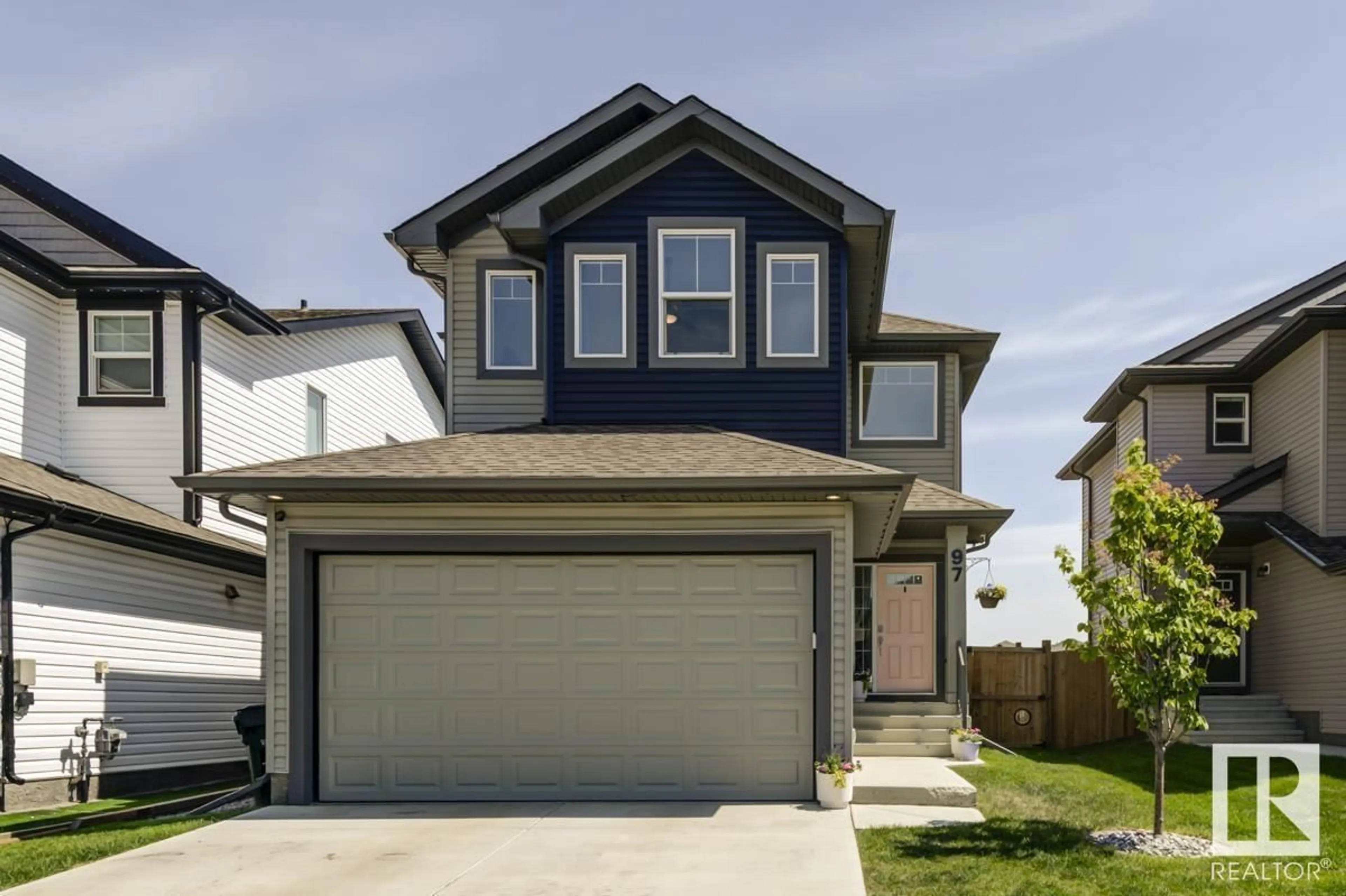 Home with vinyl exterior material, street for 97 SUMAC LN, Sherwood Park Alberta T8H1Z9