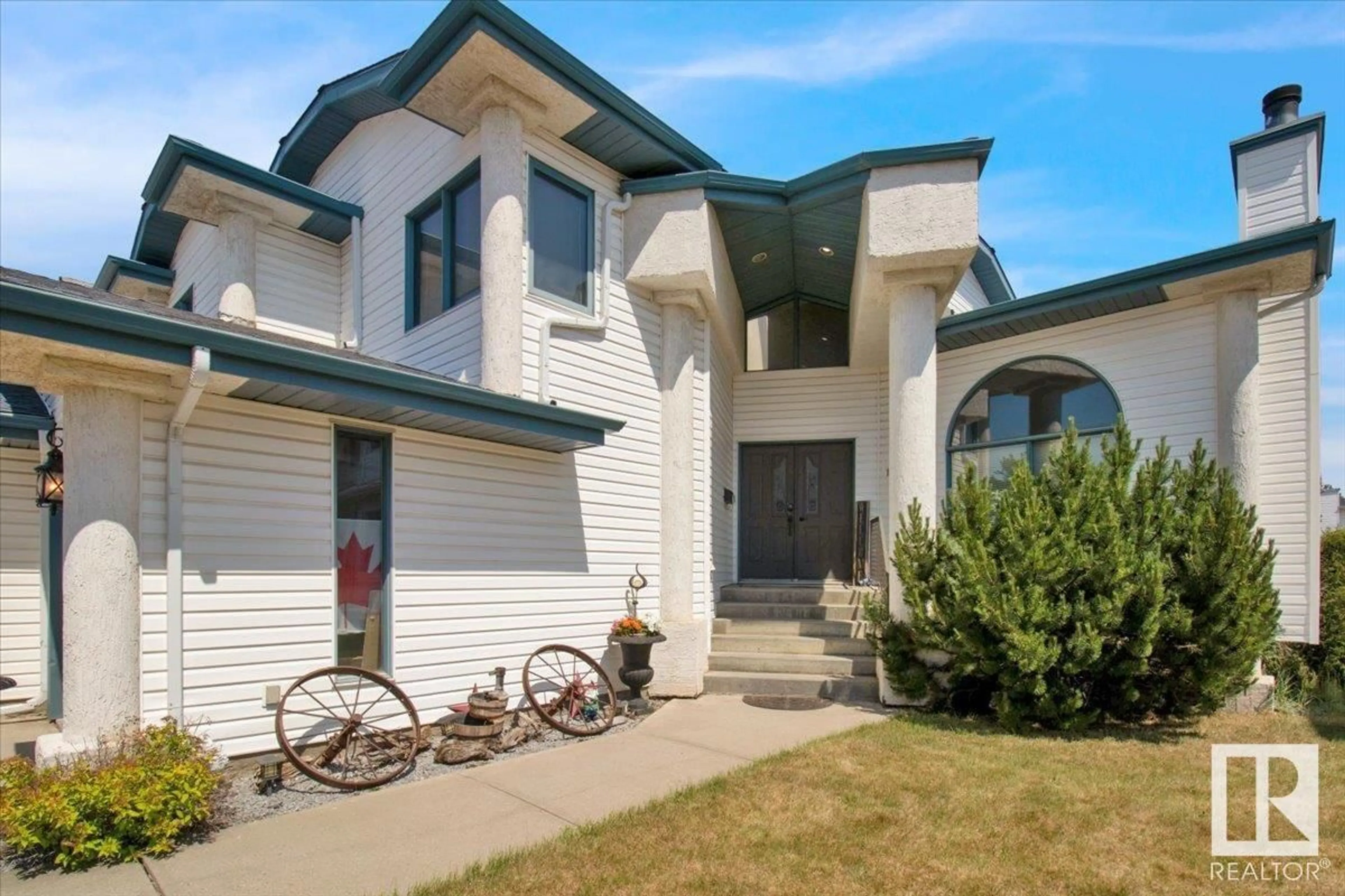Home with vinyl exterior material, street for NW - 15935 58 ST, Edmonton Alberta T5Y2R5