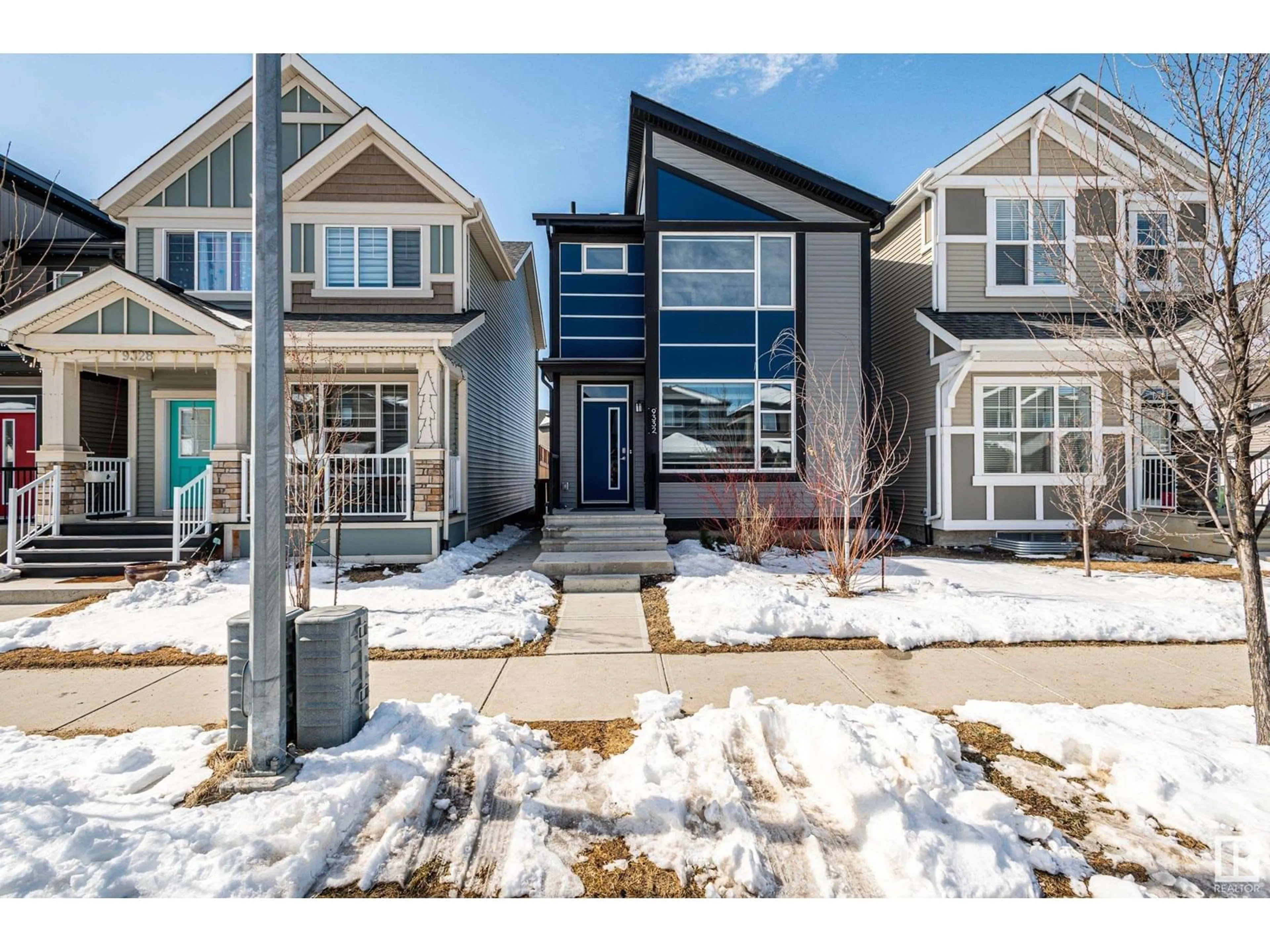 Home with vinyl exterior material, street for 9332 223 ST, Edmonton Alberta T5T7K1