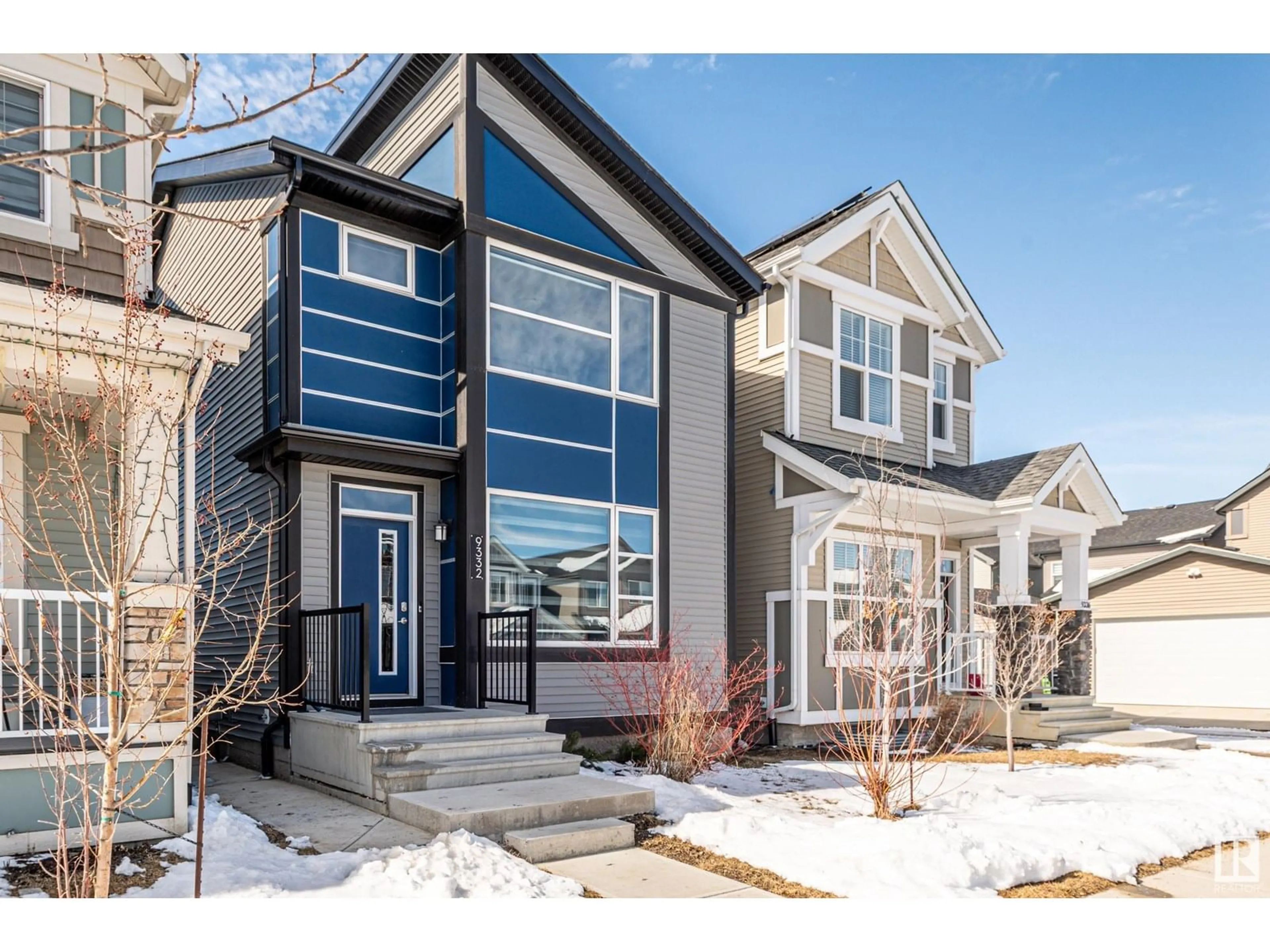 Home with vinyl exterior material, street for 9332 223 ST, Edmonton Alberta T5T7K1