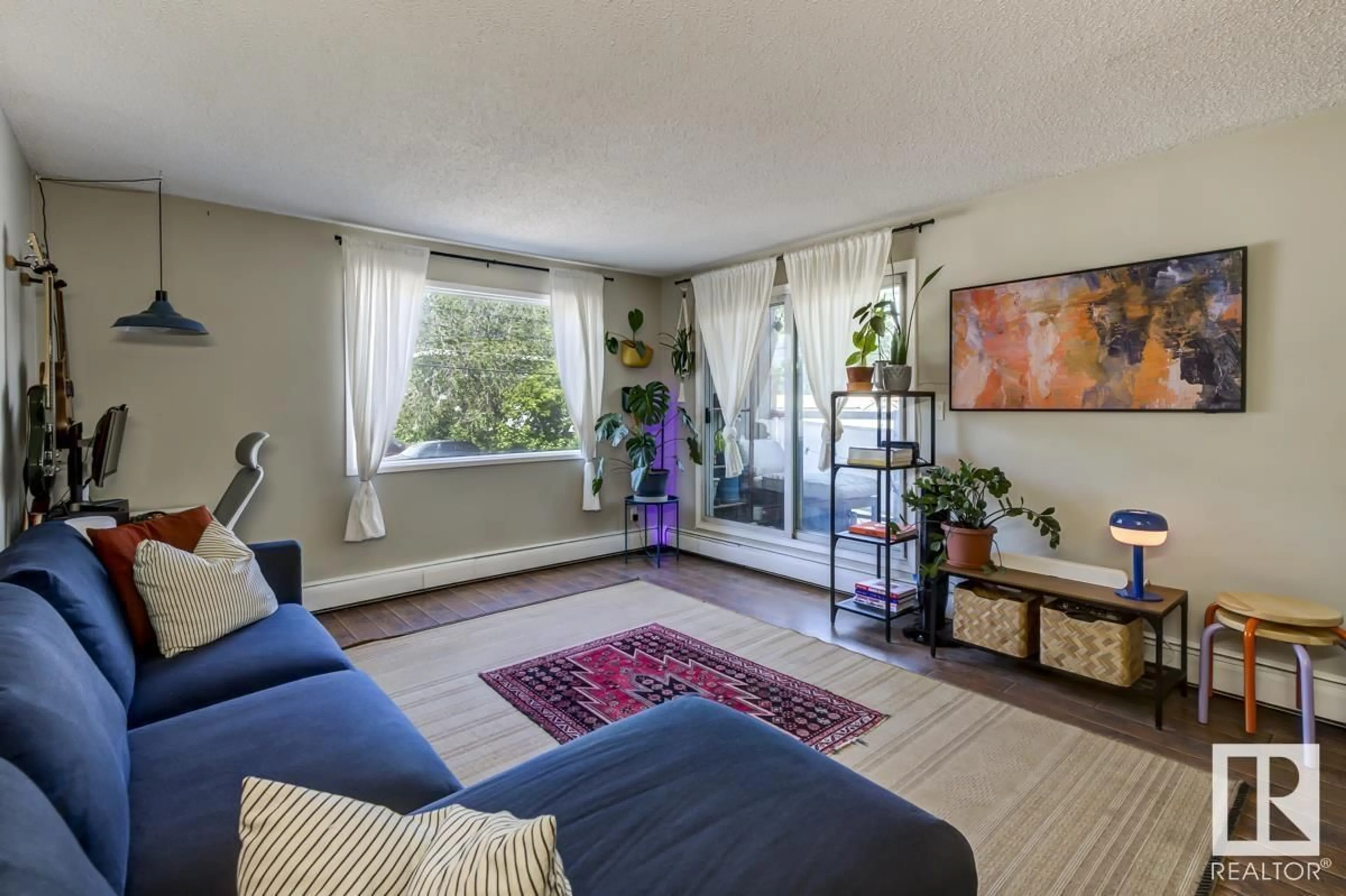 Living room with furniture, unknown for 202 - 10432 76 AV, Edmonton Alberta T6E1L1