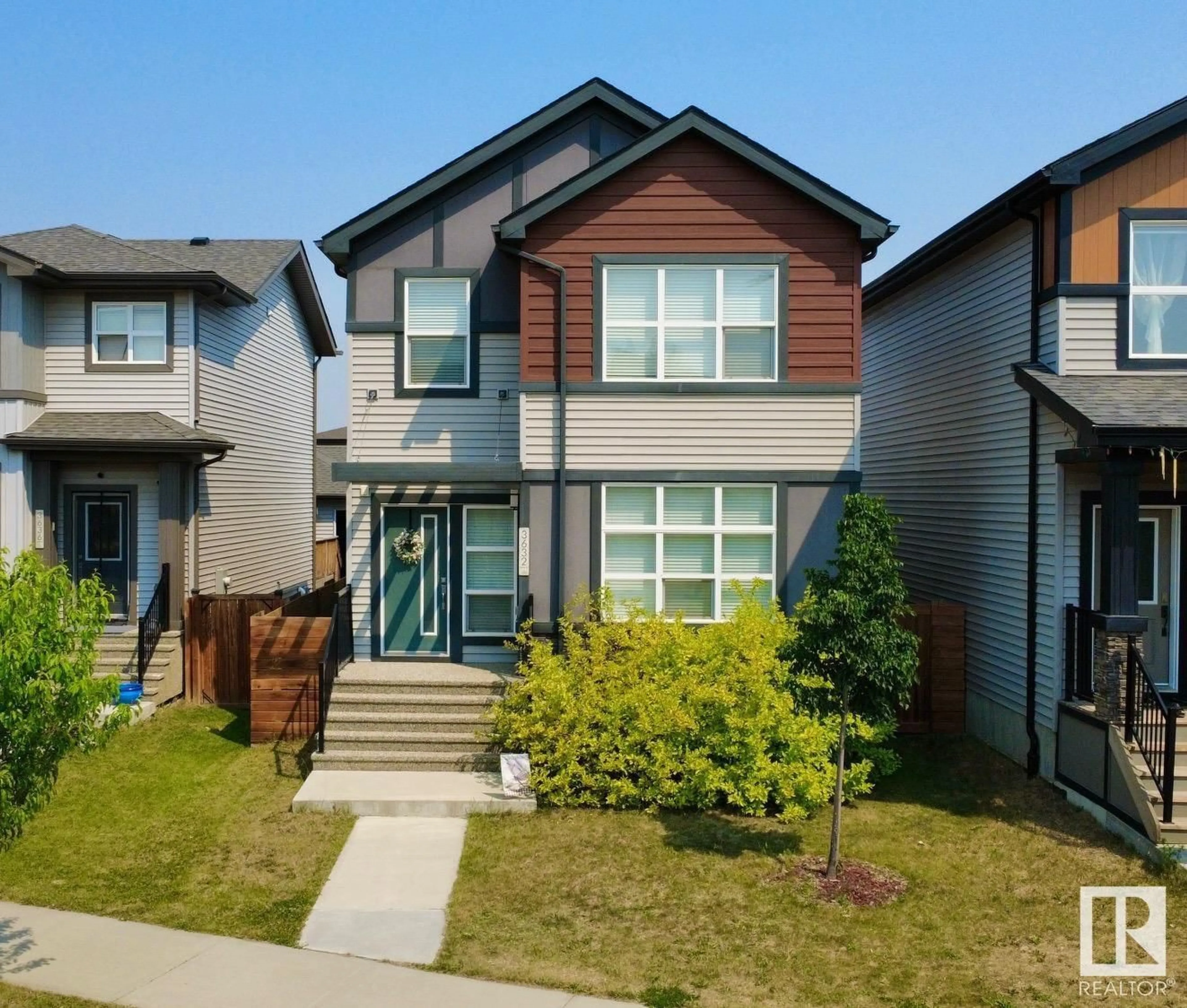 Home with vinyl exterior material, street for 3632 8 AV, Edmonton Alberta T6X2G6