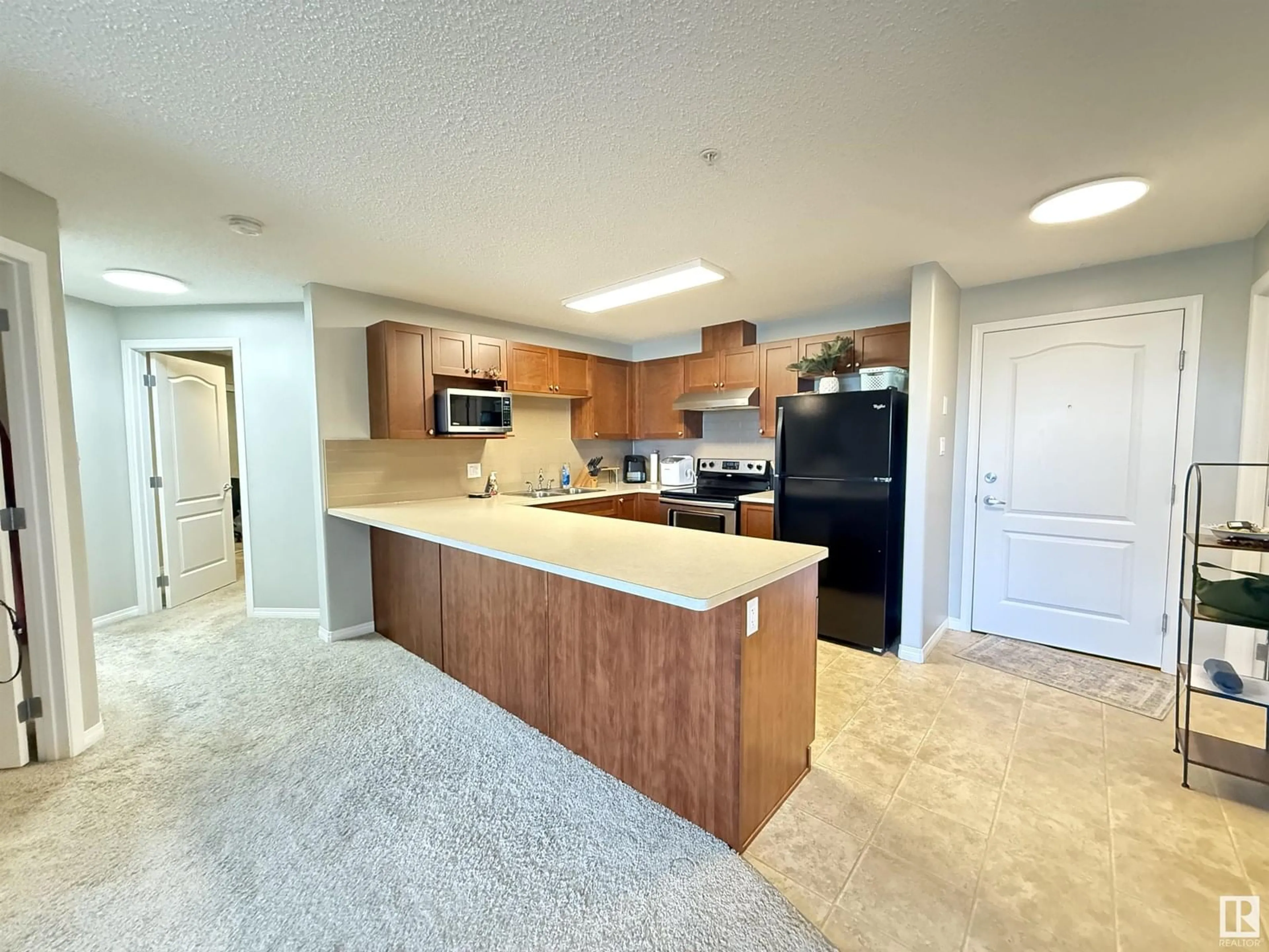Open concept kitchen, unknown for #212 - 1520 HAMMOND GATE GA, Edmonton Alberta T6M0J4