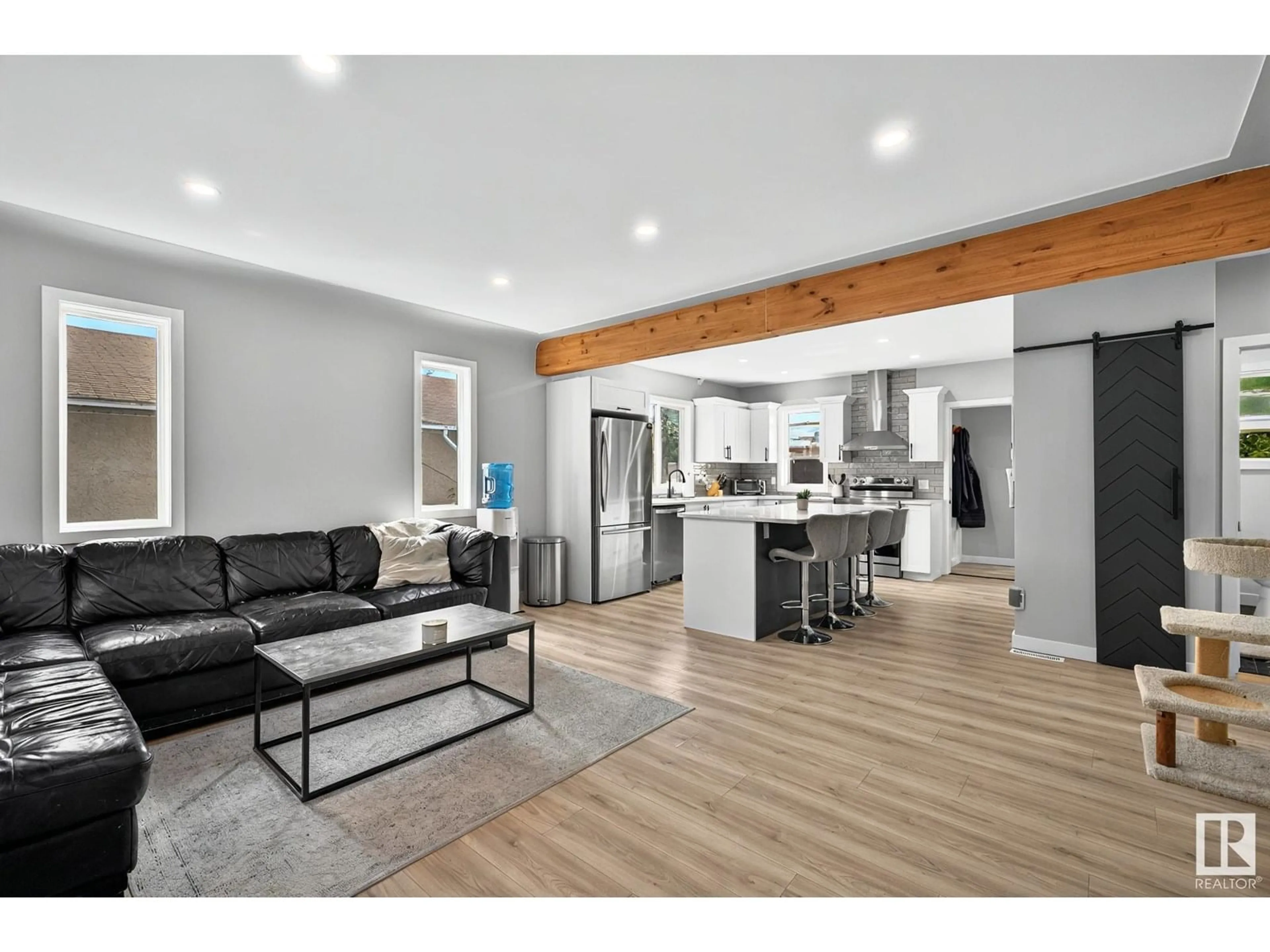 Open concept kitchen, wood/laminate floor for 12714 126 ST, Edmonton Alberta T5L0X8