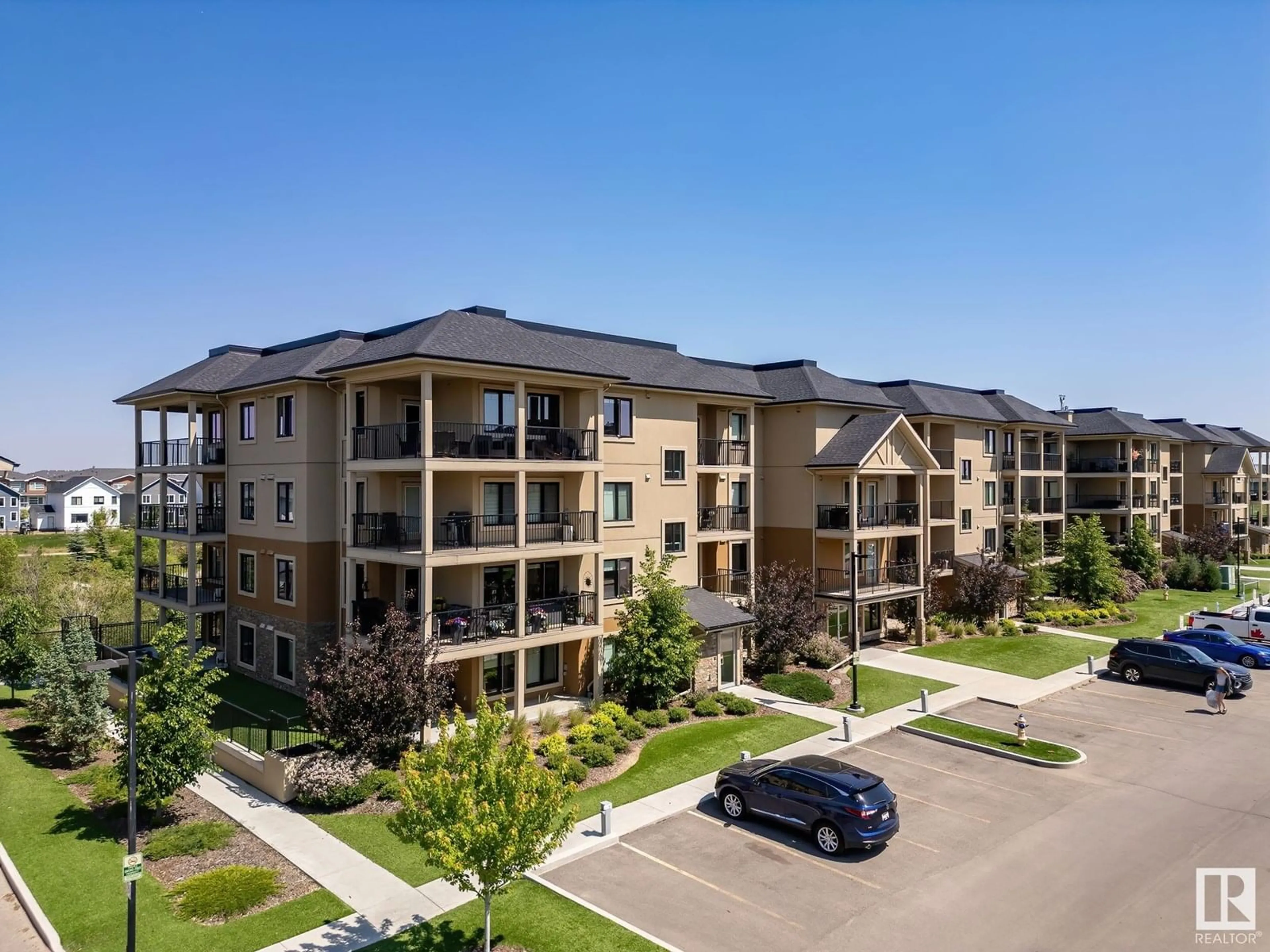 A pic from outside/outdoor area/front of a property/back of a property/a pic from drone, unknown for #306 - 1027 173 ST, Edmonton Alberta T6W2E4