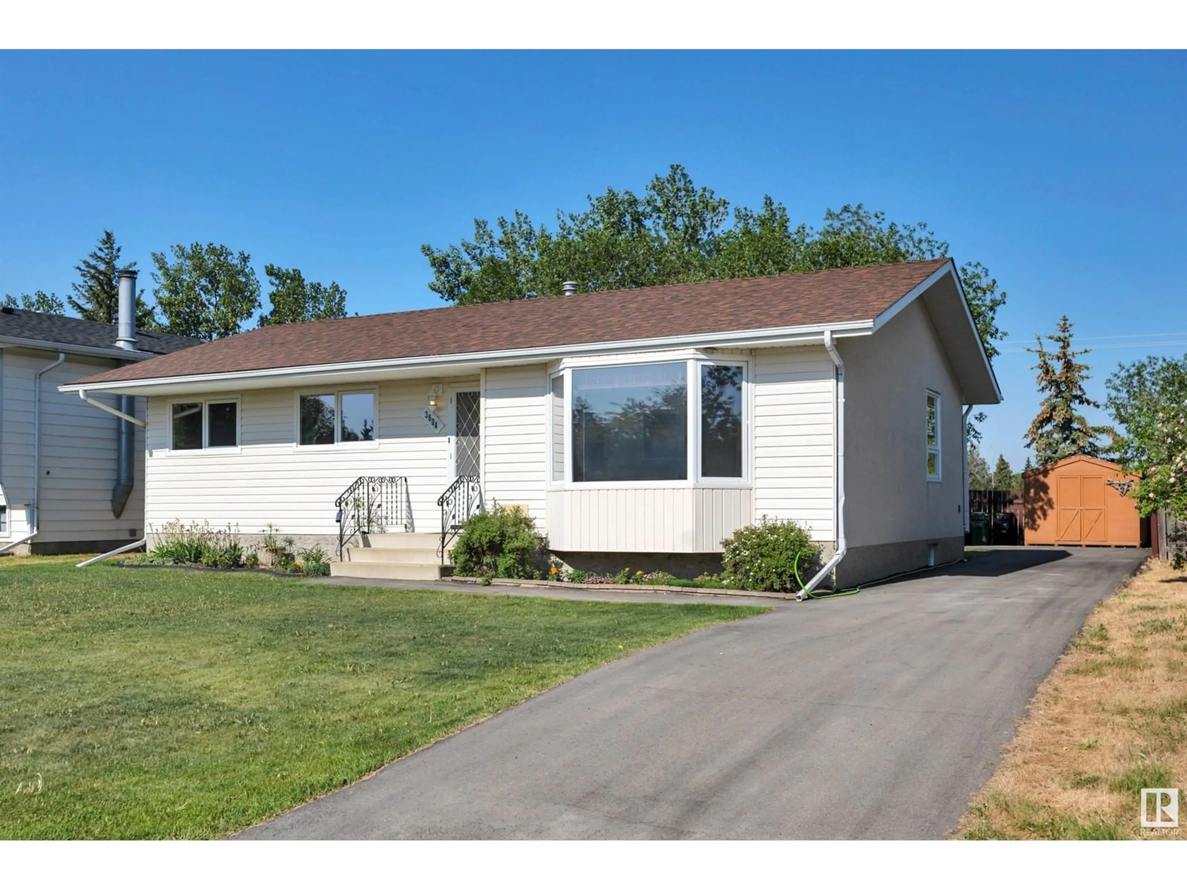 Home with vinyl exterior material, street for 3604 44 ST, Leduc Alberta T9E6A1