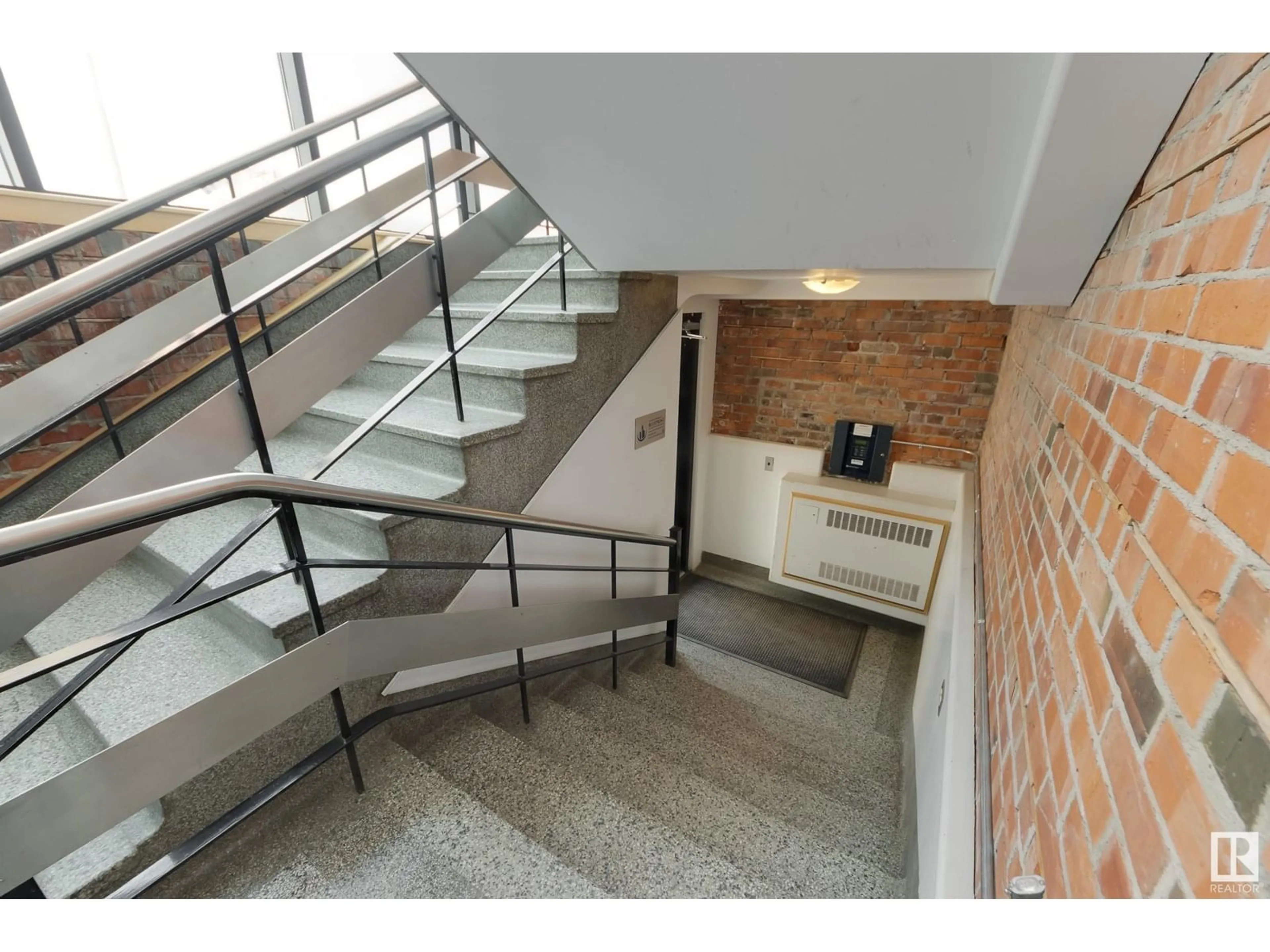 Indoor foyer for #104 - 10265 107 ST NW, Edmonton Alberta T5J5G2