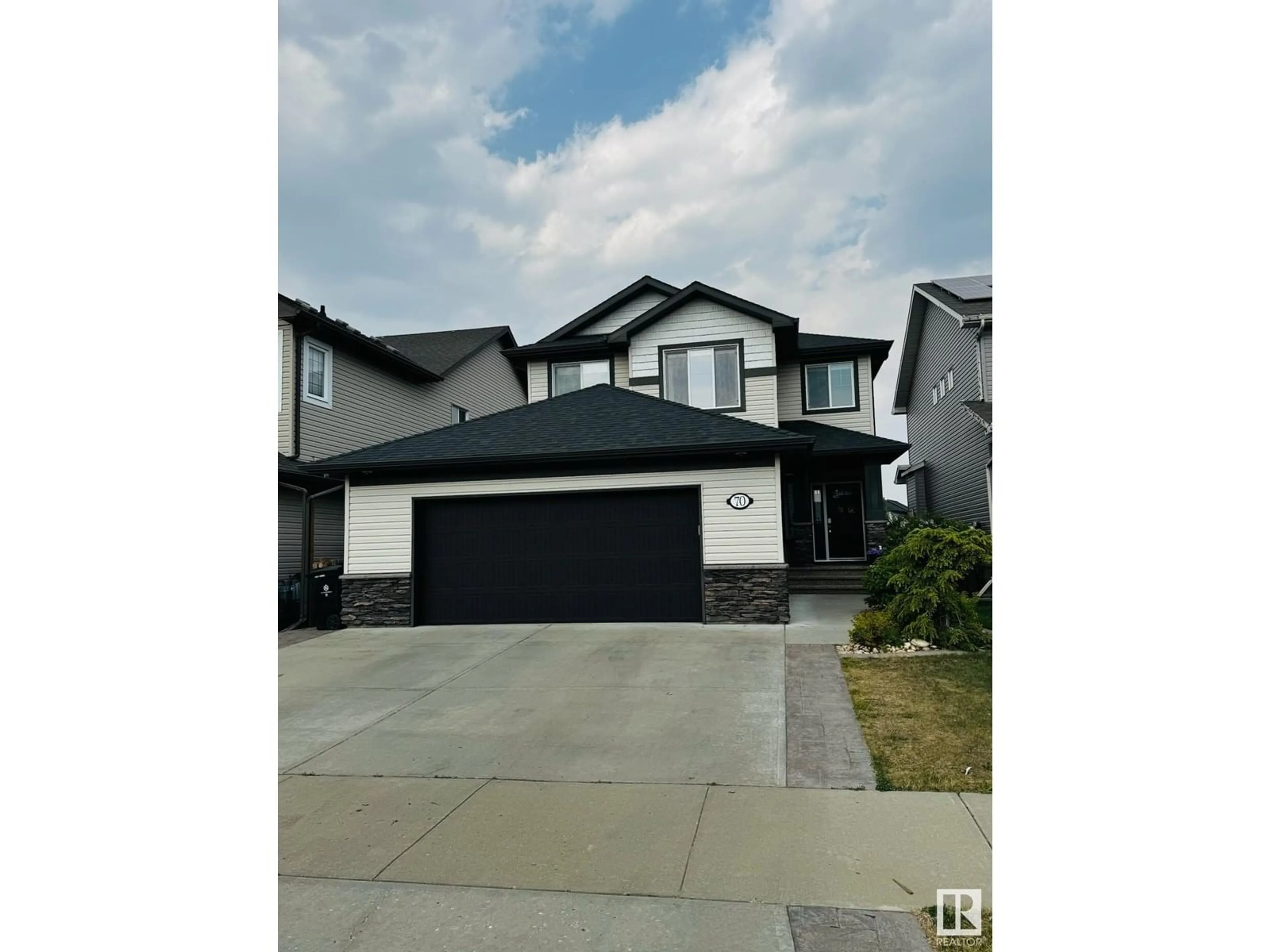 Home with vinyl exterior material, street for 70 CRANBERRY BN, Fort Saskatchewan Alberta T8L0K4