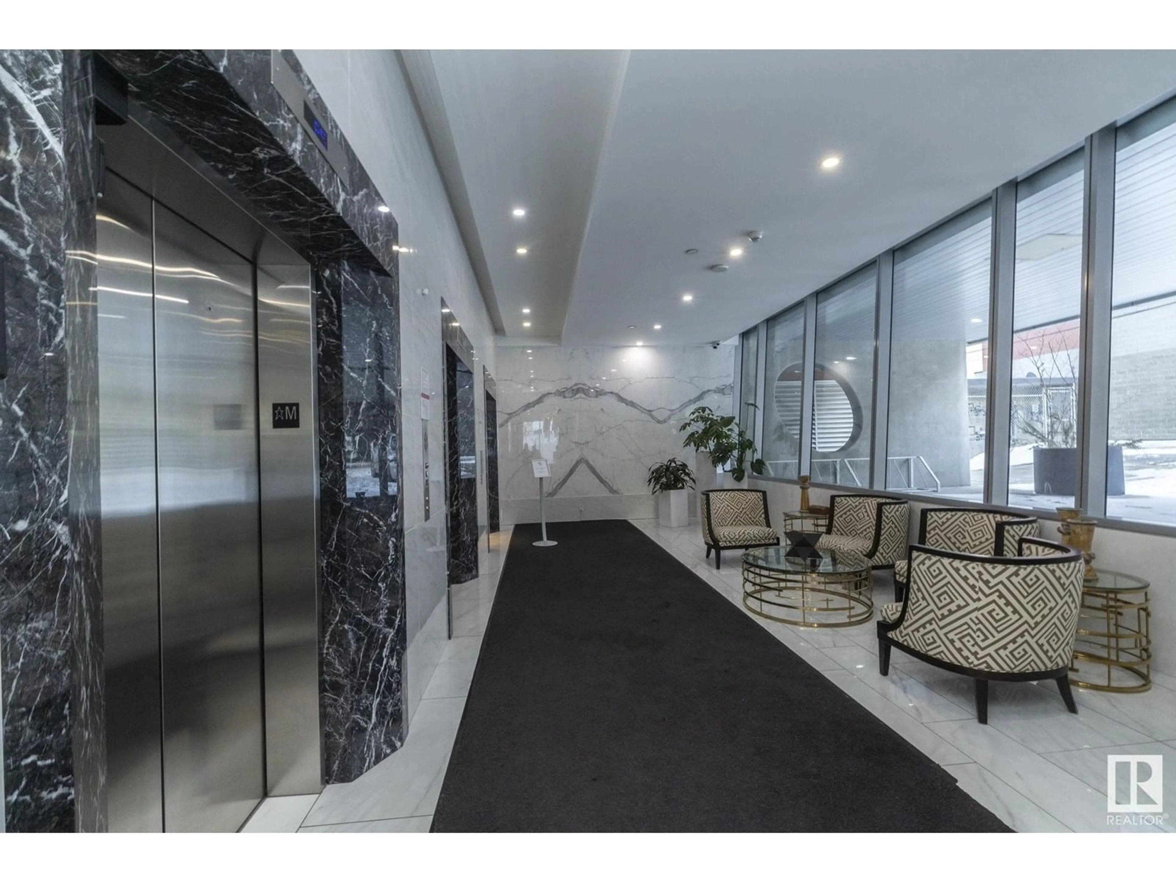 Indoor foyer for 202 - 11969 JASPER AV, Edmonton Alberta T5K0P1