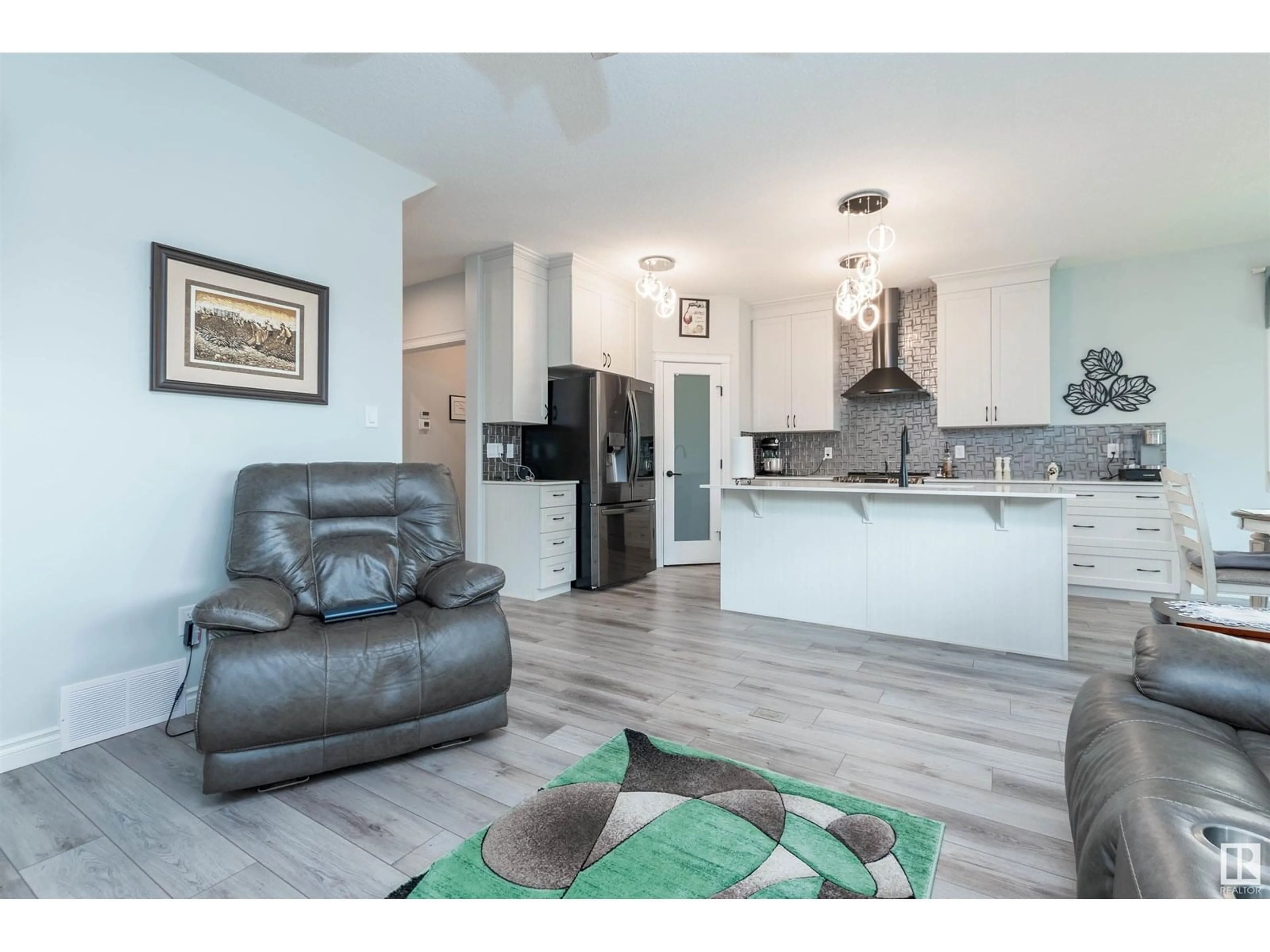 Open concept kitchen, wood/laminate floor for 145 SUMAC LN, Sherwood Park Alberta T8H1Z9