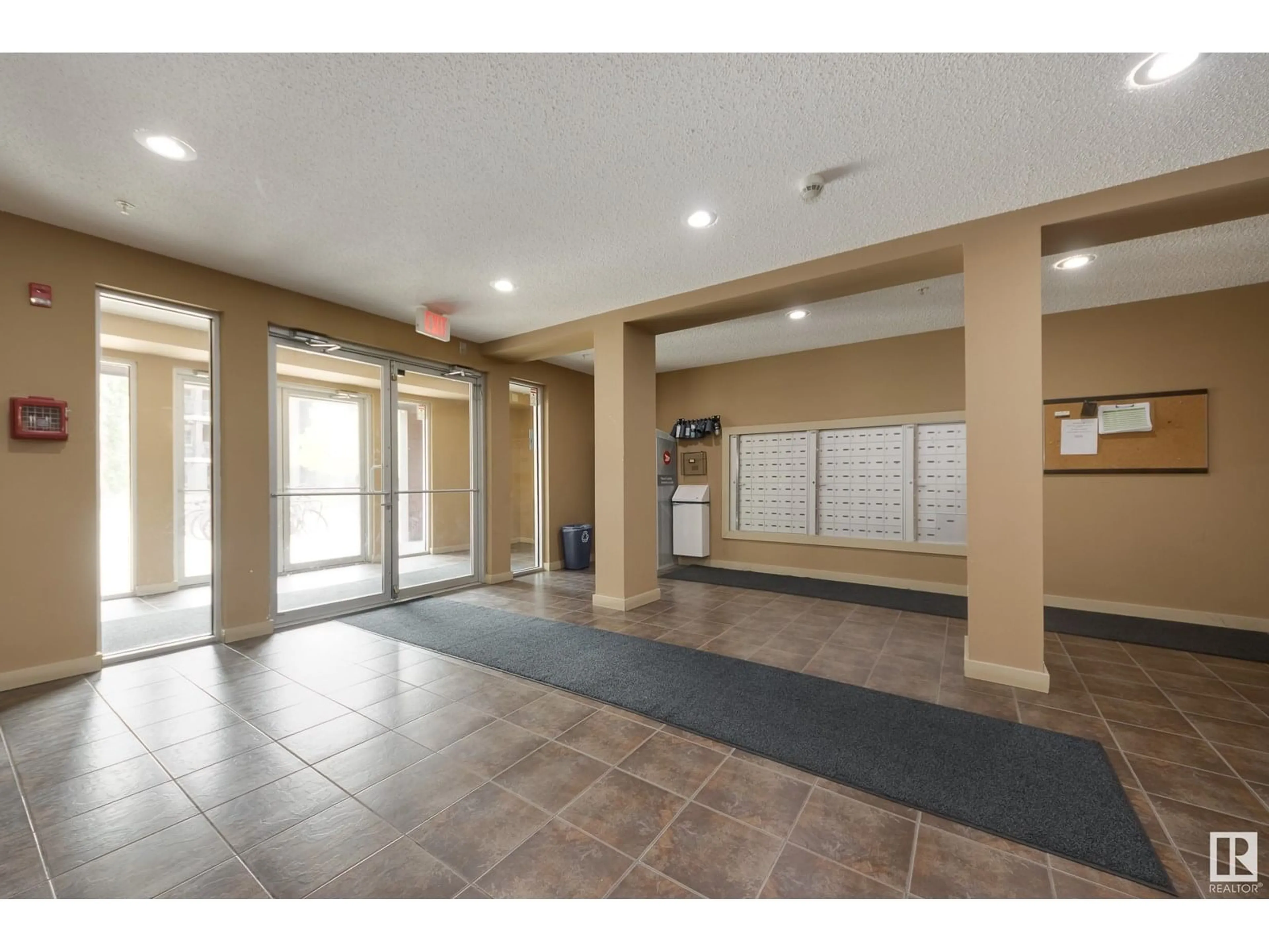 Indoor foyer for 12025 - 210 22 AV, Edmonton Alberta T6W2Y1
