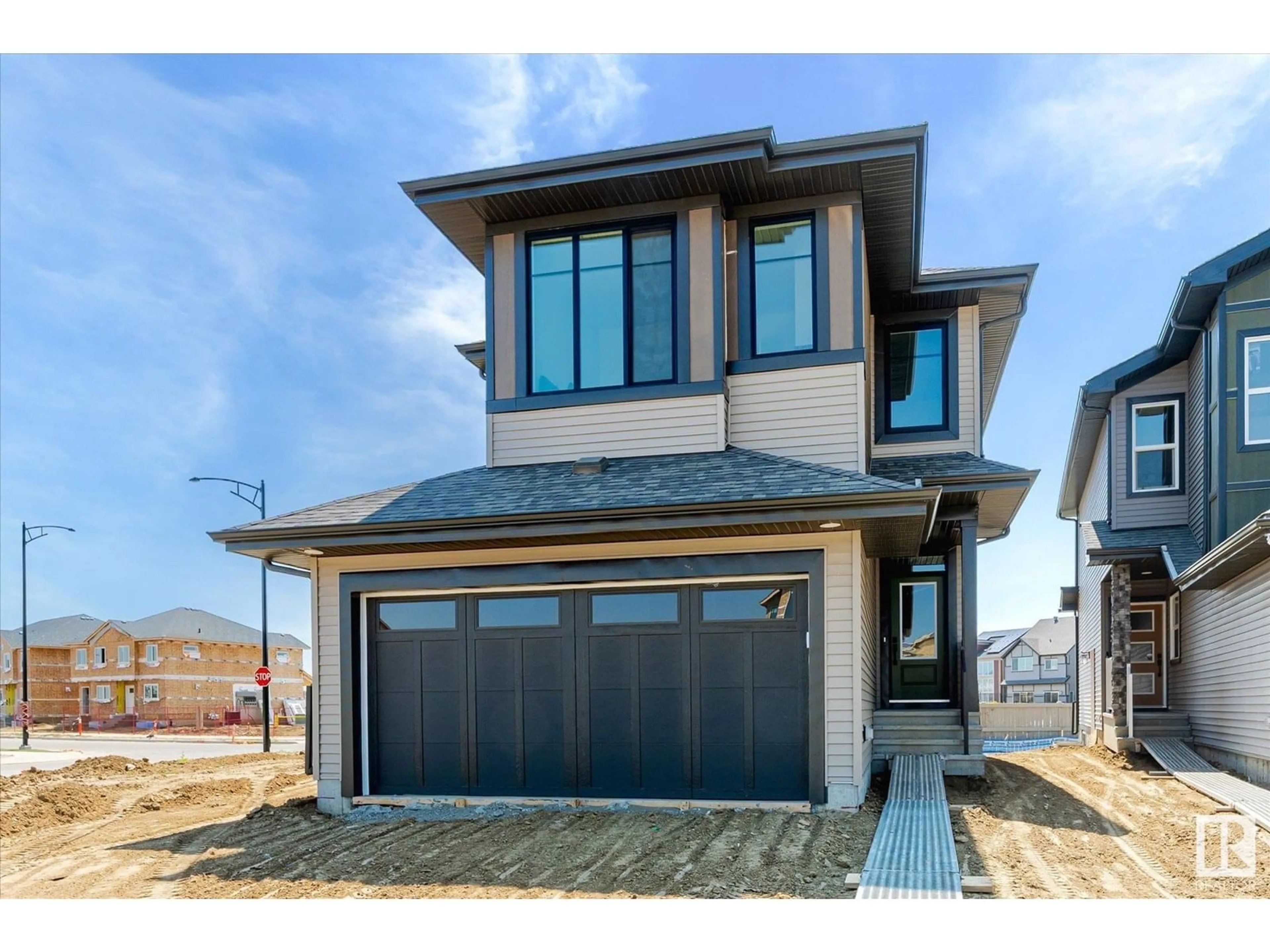 Home with vinyl exterior material, street for NW - 22371 89 AV, Edmonton Alberta T5T7X2