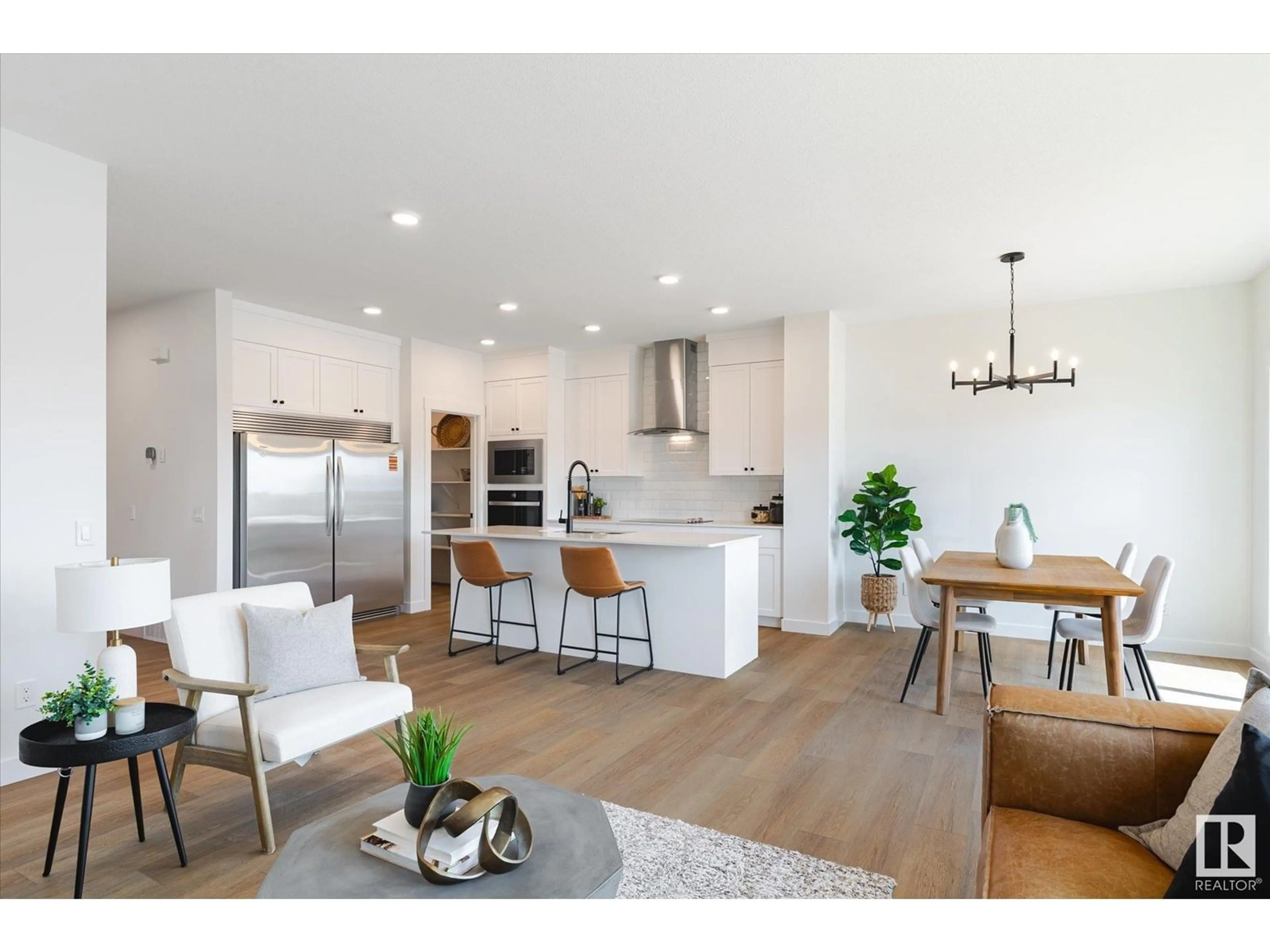 Open concept kitchen, wood/laminate floor for NW - 22371 89 AV, Edmonton Alberta T5T7X2