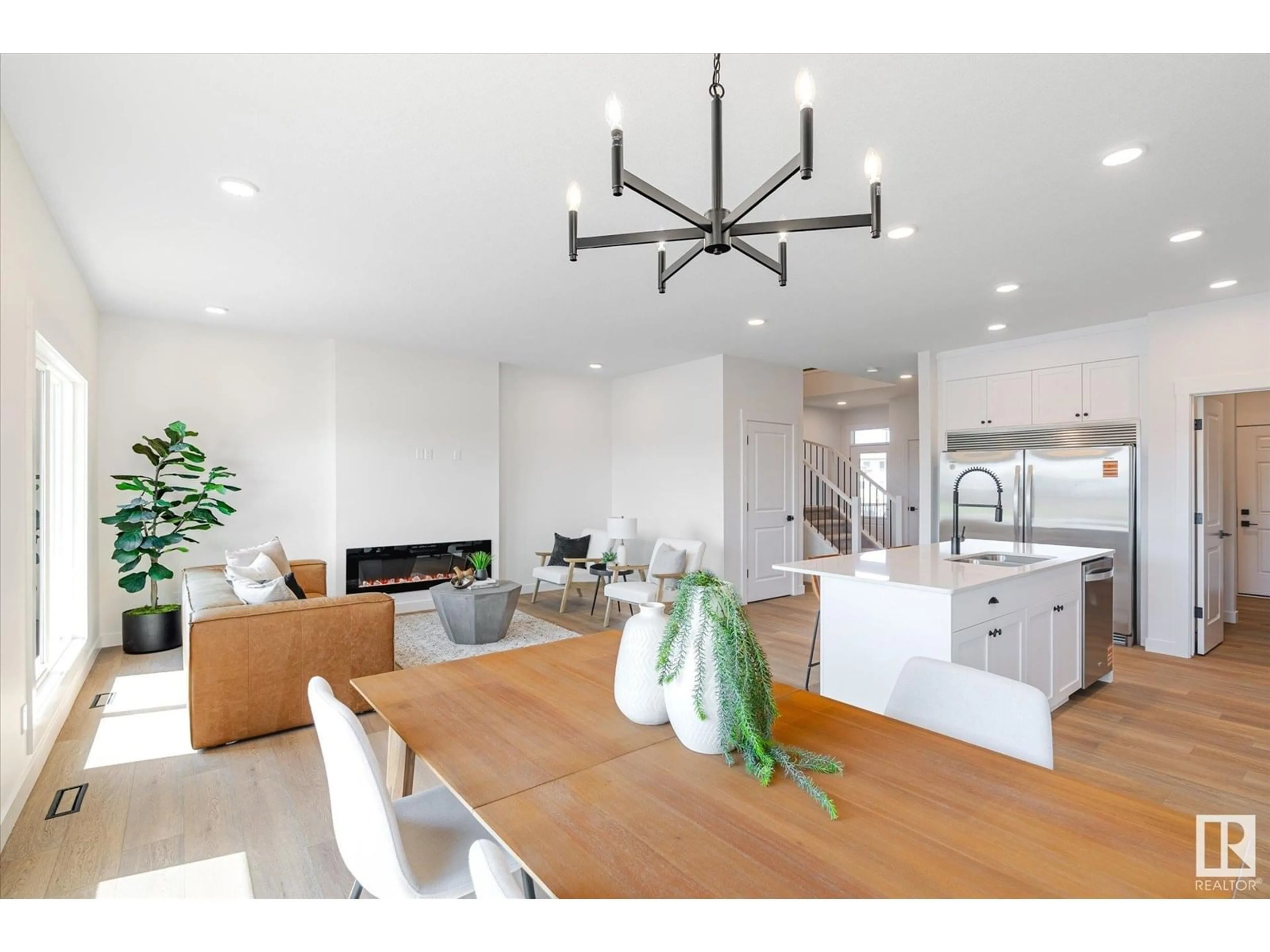 Open concept kitchen, wood/laminate floor for NW - 22371 89 AV, Edmonton Alberta T5T7X2