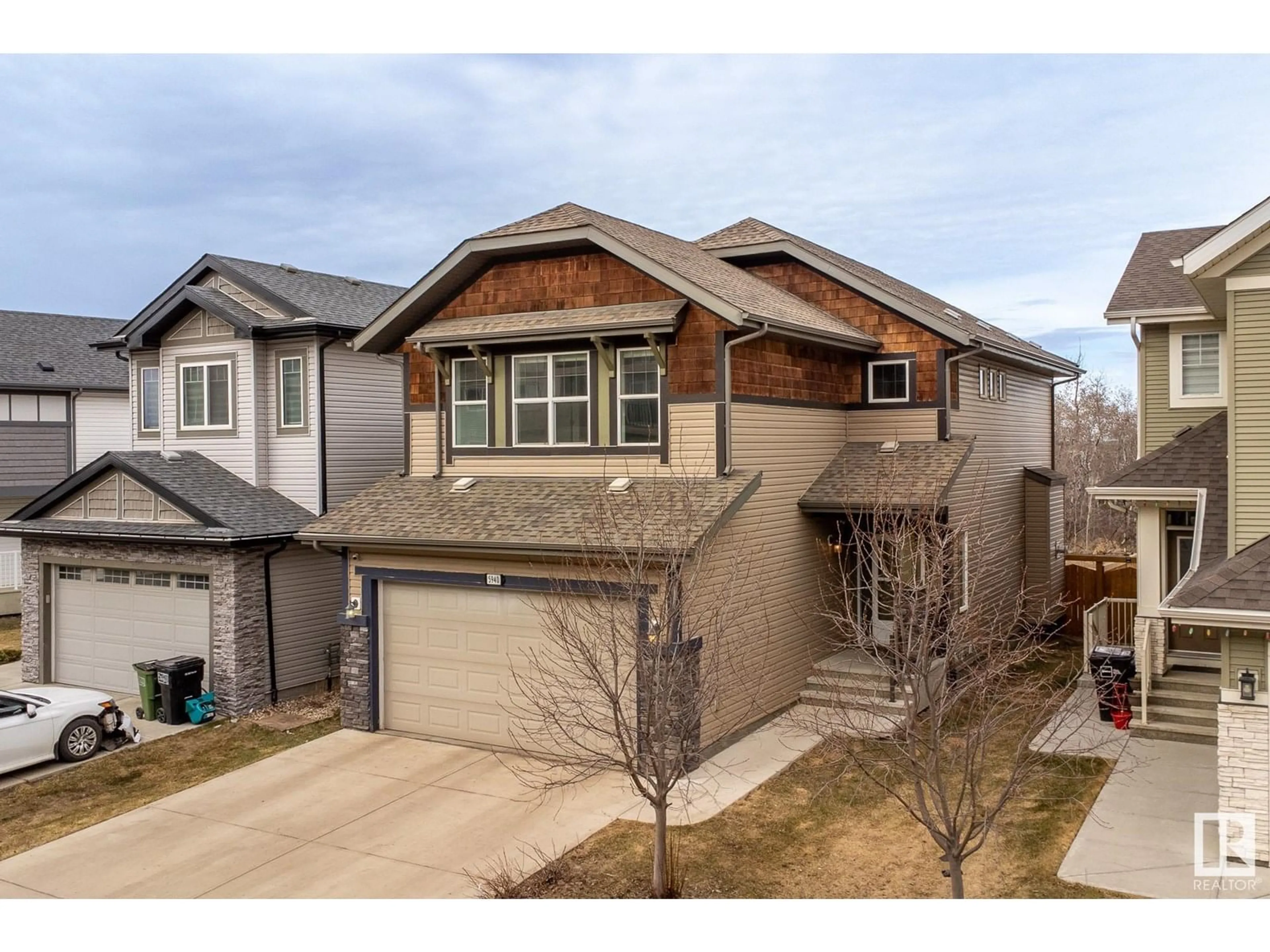 A pic from outside/outdoor area/front of a property/back of a property/a pic from drone, street for NW - 5940 174 AV, Edmonton Alberta T5Y3V7