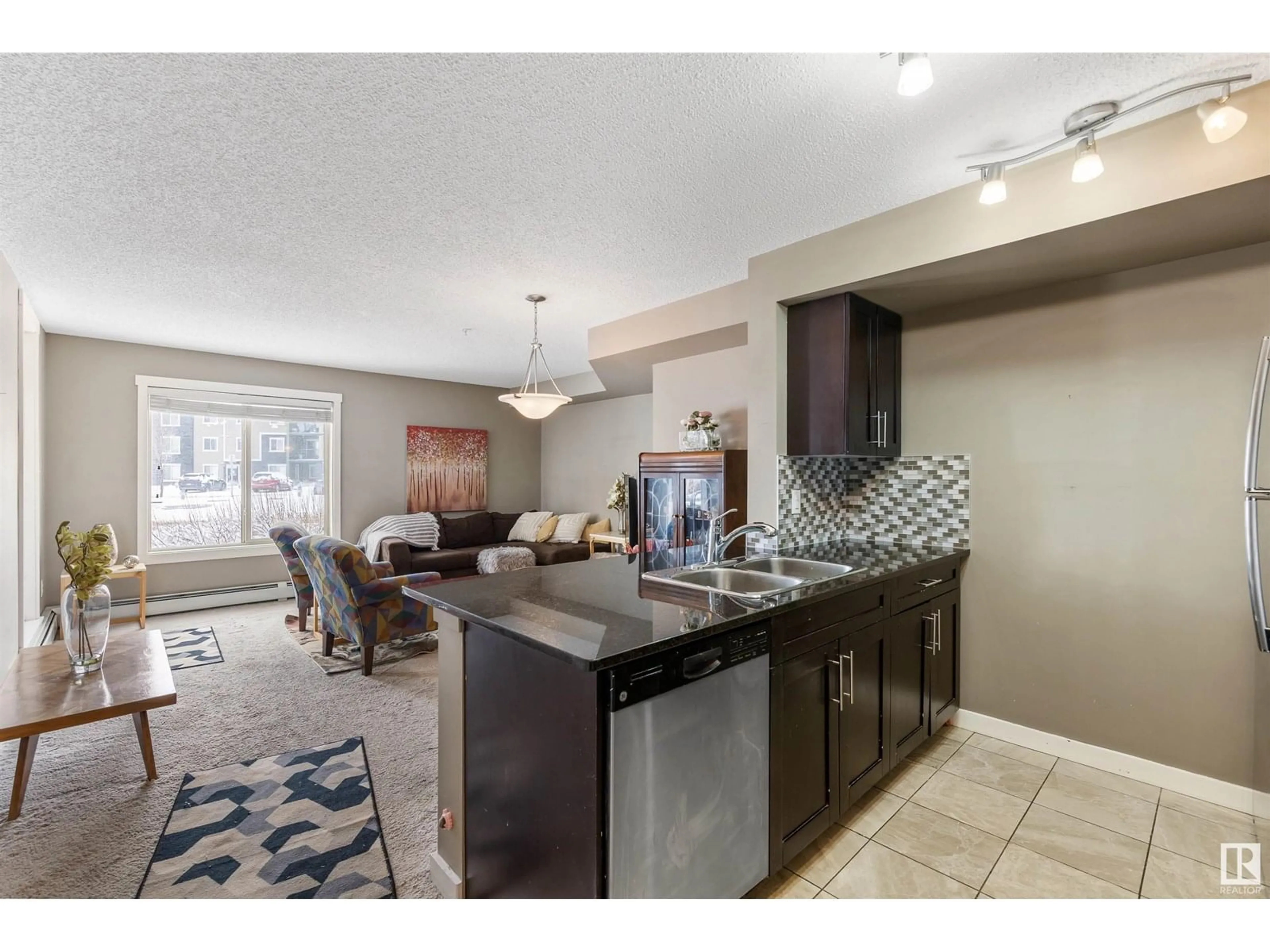Open concept kitchen, ceramic/tile floor for #104 - 25 ELEMENT DR, St. Albert Alberta T8N7S1