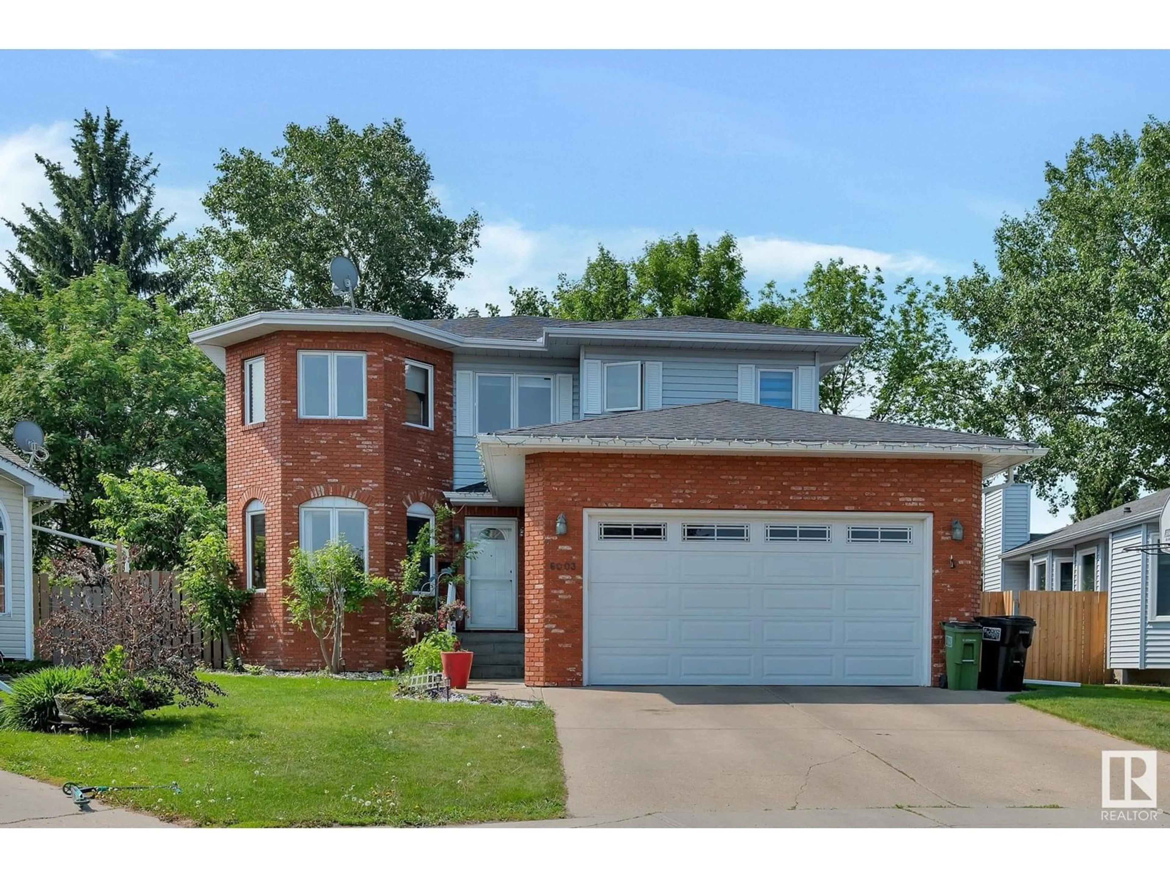 Home with brick exterior material, street for 6003 37B AV, Edmonton Alberta T6L6E6