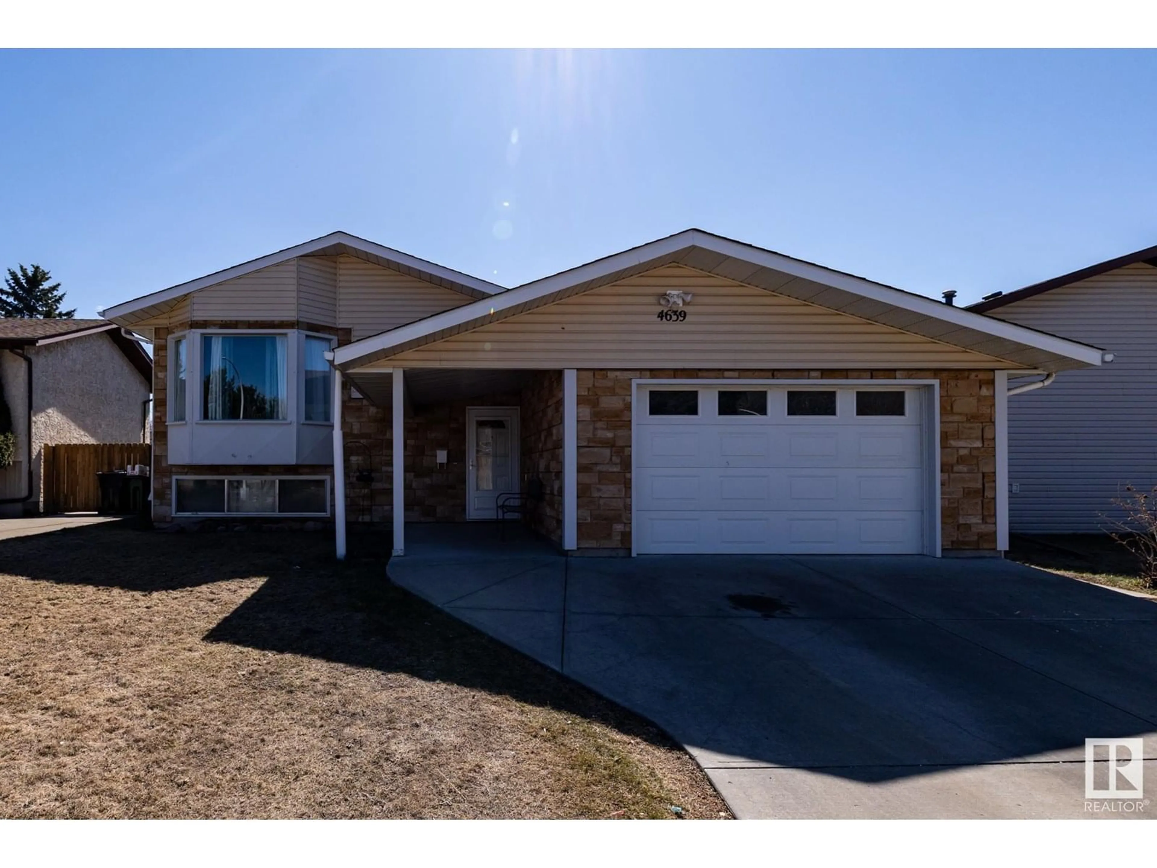Home with brick exterior material, street for 4639 17 AV, Edmonton Alberta T6L2Z4